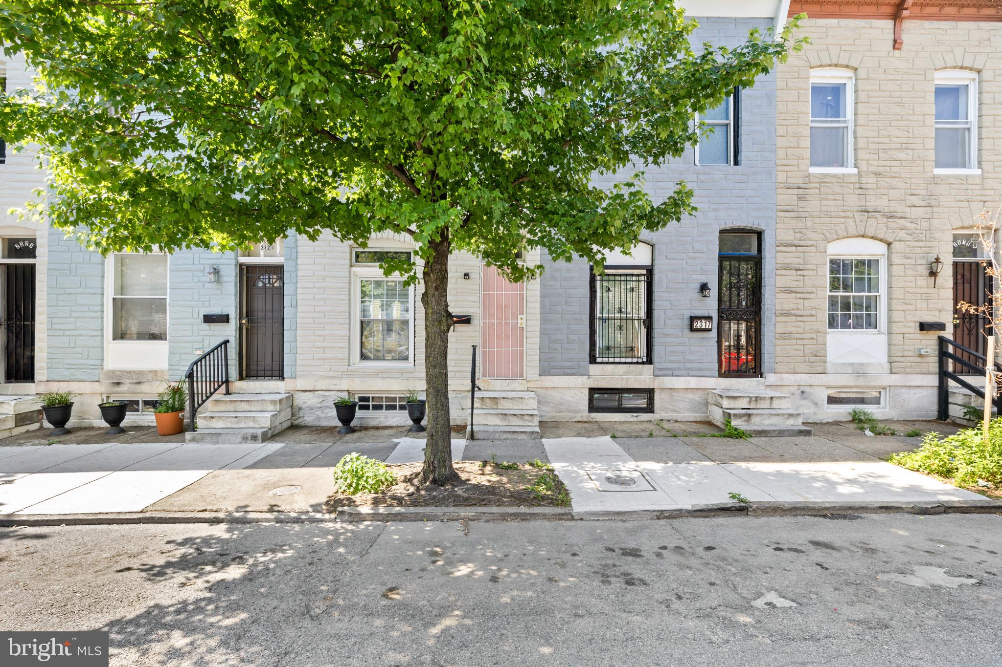 Welcome to this beautifully renovated townhome in the heart of McElderry Park! This move-in ready home offers 3 spacious bedrooms, 2.5 bathrooms, and stylish updates throughout. The stunning kitchen features an eat-in island, modern finishes, and ample cabinet space, flowing seamlessly into the main living areas with gleaming hardwood floors. The fully finished lower level provides additional living space with a full bathroom and flexible room perfect for a guest suite, home office, or recreation area. Conveniently located just minutes from Johns Hopkins Hospital, downtown Baltimore, major commuter routes, parks, restaurants, and shopping. This exceptional renovation combines modern comfort with unbeatable value—schedule your showing today!