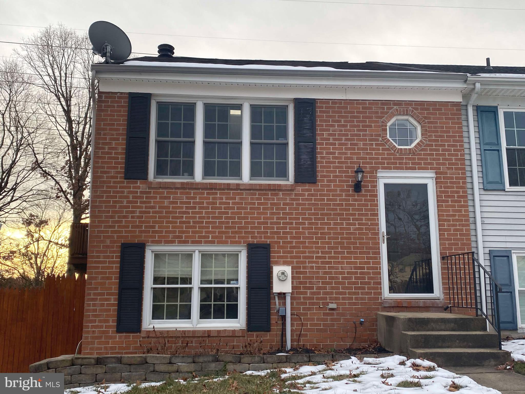 Welcome to 8616 Castlemill Circle, a 3 Bedroom, 1.5 bath town home in the heart of Nottingham! This 1320 sqft, End of Group townhome has NO HOA, plenty of parking, a large deck, and fully fenced back yard. Just beyond the foyer is a gorgeous living room with vaulted ceilings, hardwood floors, and wood burning fireplace, and skylights allowing for an abundance of natural light. An updated half bath powder room is on the main level, next to the washer/dryer leading to the updated kitchen which looks over the formal dining room. Beyond the sliding doors is a wrap-around deck. Downstairs you will find 3 generous sized bedrooms, and an updated full bathroom. Beyond the primary bedroom is a smaller deck leading to the fully fenced, and private back yard.  This home has been very well maintained, freshly painted and is ready for you to move right in! Close to everything - shopping at the Ave of White Marsh with Ice Skating, Shops, and Restaurants, and also easy access to Rt. 43, 695, and I-95.
