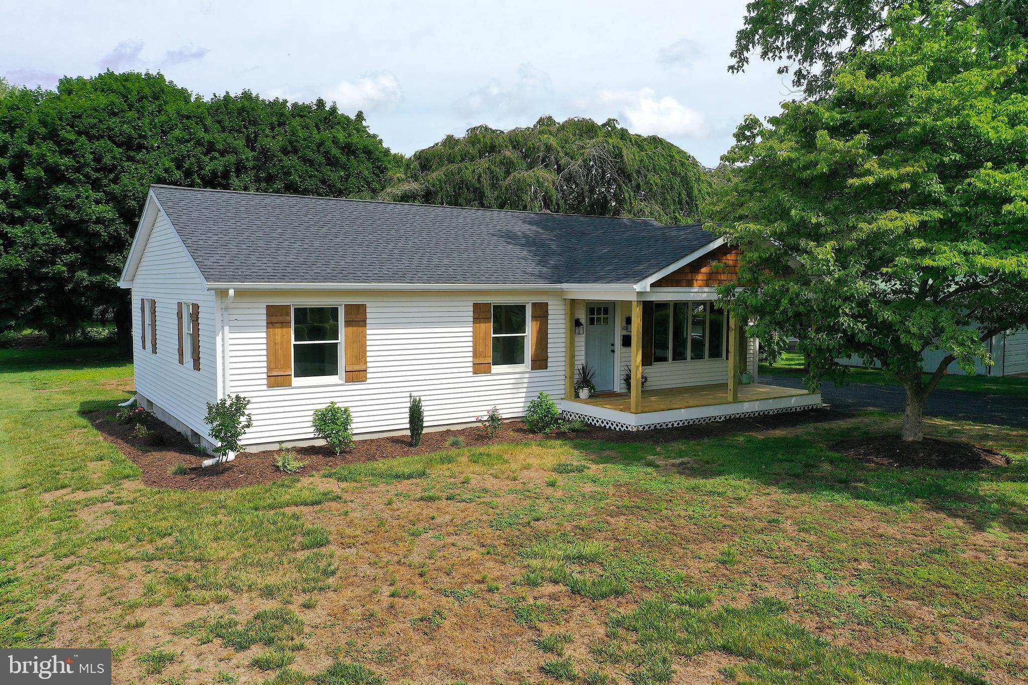 Welcome to this beautifully remodeled 3-bedroom, 2-bathroom rancher situated on nearly a half acre of land in the heart of historic Berlin, Maryland, without the burden of HOA fees! Thoughtfully updated from top to bottom, this one-story home with a basement combines modern finishes and conveniences with the comfort and functionality of single-level living.
Step inside to discover bright, inviting living spaces designed for everyday living and entertaining alike. The spacious layout flows seamlessly from room to room, creating a warm and welcoming atmosphere throughout, while the basement provides additional storage, workspace, or future possibilities to suit your needs. Outside, the expansive lot offers endless opportunities for gardening, outdoor gatherings, recreation, or simply enjoying the privacy and open space! Located just steps from Berlin?s award-winning Main Street, you'll enjoy easy access to charming boutiques, local restaurants, coffee shops, parks, and year-round community events. Whether you're searching for a primary residence or a weekend getaway near the beaches of Ocean City and Assateague Island, this move-in-ready home offers the perfect blend of location, convenience, and small-town charm. Don't miss this rare opportunity!