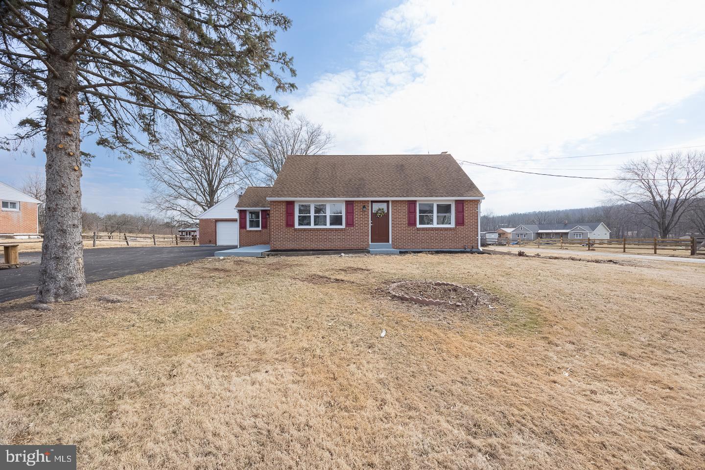Welcome home to this beautiful 4-5 bedroom Cape Cod in New Hanover Township and highly sought after Boyertown School District on 1/2 acre lot! This newly renovated home features ALL NEW windows, doors, gutters/downspouts, BRAND NEW driveway, hot water heater, Central Air, water softener system, well tank, updated electrical, PEX plumbing and neutral paint throughout. There’s nothing to do but move in!  Step inside the beautifully updated eat-in kitchen with all NEW STAINLESS-STEEL appliances, QUARTZ countertops, soft close hinges, tile backsplash, garbage disposal with tile floors and hardwood floors in the eat-in kitchen area. Go through the double doors  off the kitchen to the BONUS room that can be used as a 5th bedroom, office, playroom, additional family room or an IN-LAW suite as it has an attached FULL bath with a walk-in shower, hardwood floors and large closet. There is access to the large concrete back patio to enjoy those warm summer nights under the stars or hosting BBQs with friends and family! The  backyard is flat and backs up to a field and wildlife! Great for children and dogs to play! Completing the first floor is 2 bedrooms, another FULL bath with tiled tub/shower combo, hall linen closet and spacious living room with plenty of windows to allow for natural light to flow in. The second floor features 2 nice sized bedrooms that are carpeted with closets and attic access. The full walk out basement is dry and clean and features the laundry area with BRAND NEW washer/dryer, utility sink, utility area and tons of storage space. Finish it and you will add more living space!! The 2 car OVERSIZED garage is very spacious with a BRAND new garage door, and a full sized staircase leading up to a finished area with carpet that would make a great Man/Woman Cave, sports room or office! The driveway is also oversized and allows for plenty of parking for the car enthusiast! Conveniently located to major routes, community parks, entertainment, shopping, COSTCO and Philadelphia Premium Outlets!! This home has so much to offer! Schedule your personal tour today! **Professional photos will be in Tuesday evening**