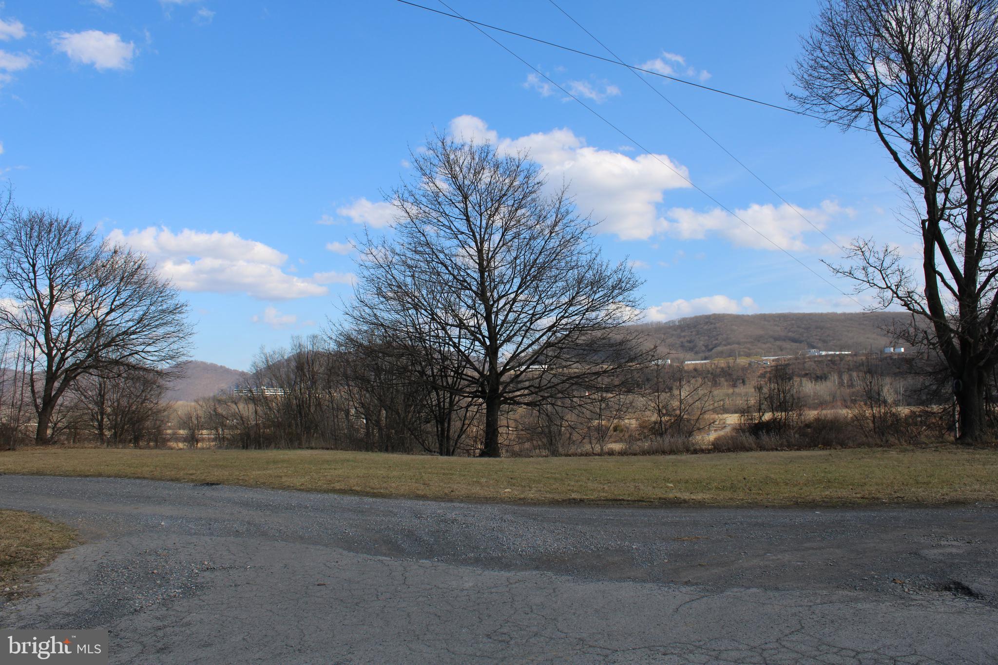 Perfectly situated, this parcel of land spanning 2.87 acres near Cresaptown, Maryland, presents an exceptional opportunity for various commercial or industrial ventures. Boasting superb visibility, with approximately 8,000 vehicles traversing the location daily (*traffic data available in the documents tab), it offers prime exposure for prospective businesses. Benefiting from its strategic location, the property enjoys excellent connectivity to Cumberland, MD, the I-68 corridor, as well as Keyser and Ft. Ashby, WV. Its proximity to major hubs ensures convenient access and facilitates seamless operations. This property is tailor-made for an owner-occupant seeking to establish a new enterprise or an astute investor eyeing a lucrative redevelopment project. Its close proximity to established entities such as Allegheny Ballistics Lab, American Woodmark, IBM, and Northrop Grumman fosters a dynamic environment ripe with potential synergies for a multitude of uses. Don't miss out on this unparalleled opportunity to capitalize on a prime piece of real estate with endless possibilities.