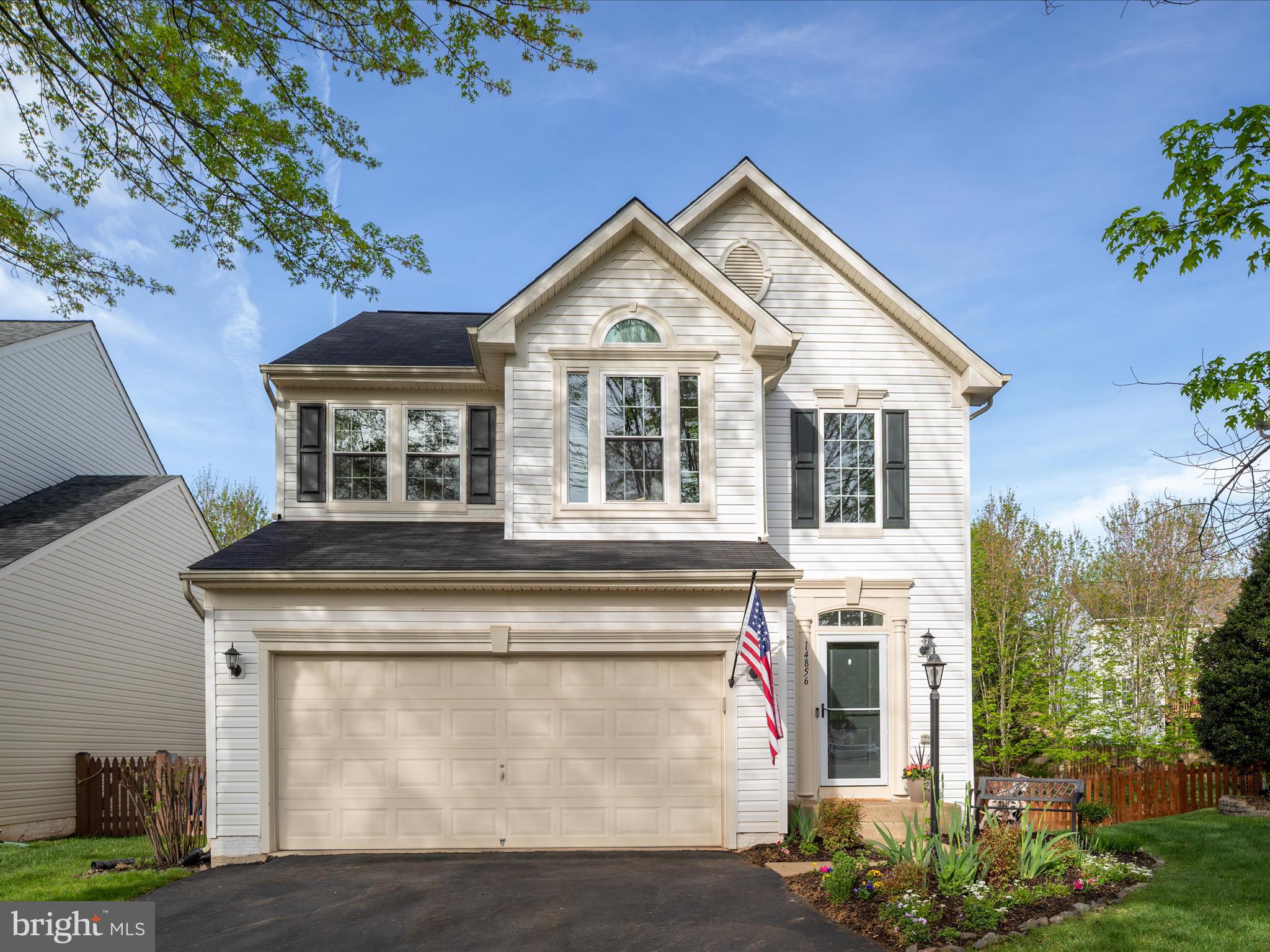 Located on a quiet street and backing to mature trees and open space, this beautifully updated home offers a spacious layout, modern finishes, and a private, fully fenced backyard. Step into a stunning two-story foyer with a custom light fixture, and enjoy refinished hardwood floors throughout the main level and upstairs hallway. The large formal dining room features elegant tray ceilings and wainscoting, perfect for gatherings. The kitchen is bright and stylish with white cabinetry, quartz countertops, a custom tile backsplash, center island, and stainless steel appliances. It opens to a light-filled family room with a cozy fireplace and views of the backyard. A private main-level study is located just off the family room—ideal for working from home. Upstairs, the spacious primary suite includes custom trim, large windows, dual closets with built-ins, and a fully renovated en-suite bathroom with modern finishes. Three additional bedrooms share a generous hall bath with double sinks, and a convenient upstairs laundry room adds ease to daily living. The finished basement offers even more space with a large rec room, full bathroom, fifth bedroom, and additional storage. Outside, enjoy the fenced backyard with a deck, patio, and playset—perfect for relaxing or entertaining. Major updates in the last five years include the roof, water heater, windows, and appliances. Community amenities offer a pool, tennis courts, three playgrounds, a nature trail, and a fishing pond. Conveniently located near shopping, restaurants, commuter lots, and top-rated schools—this home truly has it all!