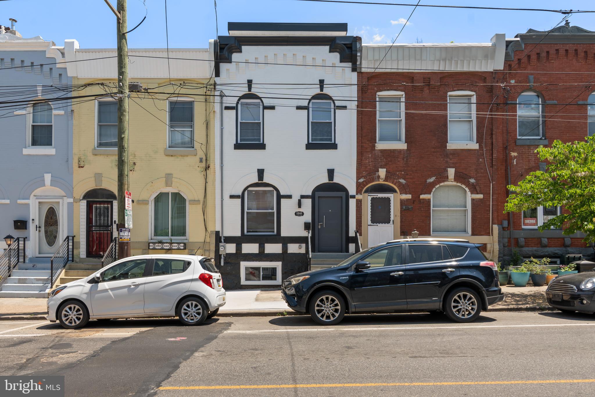Don’t miss the opportunity to own this beautifully upgraded and thoughtfully designed townhome located in the heart of Brewerytown. Situated on one of the neighborhood’s most desirable blocks, 1341 N. 29th Street is just steps from Fairmount Park and scenic Kelly Drive, offering the perfect blend of city living and outdoor recreation.

From the moment you arrive, the home’s attention to detail is evident. The striking entryway features a custom modern steel door creating exceptional curb appeal. Inside, this new construction spacious three-story residence with a finished basement offers 4 bedrooms and 4 bathrooms, designed with both style and functionality in mind.

The interior showcases natural white oak engineered flooring, iron railings, and recessed lighting throughout, creating a warm yet contemporary aesthetic. The open-concept main level is ideal for entertaining and everyday living. The eat-in kitchen is a standout, featuring 42-inch grey stone shaker cabinets, quartz countertops, a sleek clear glass backsplash, and a full suite of LG stainless steel appliances, including a vent hood and built-in microwave. A conveniently located powder room completes the main level.

The second level offers three generously sized bedrooms, a full bathroom, and a convenient laundry area with an all in-one washer and dryer, providing comfort and practicality for guests, family, or home office needs.

Occupying the entire third floor, the luxurious primary suite serves as a private retreat. This expansive space features dual walk-in closets, a spa-inspired bathroom with a freestanding soaking tub and separate glass-enclosed shower, and direct access to a private terrace finished with outdoor interlocking deck tiles, perfect for relaxing, entertaining, or enjoying the city skyline.

Additional features include, a finished basement offering additional living or recreational space, private fenced rear patio ideal for outdoor entertaining, sprinkler system, dual-zone central air, dual electrical panels and a new roof installed in July 2025. 

With premium finishes, a functional layout, and an unbeatable location, this exceptional Brewerytown home delivers modern Philadelphia living at its finest. Seller Assist Available! There's also a 10-year tax abatement. Schedule your private tour today.