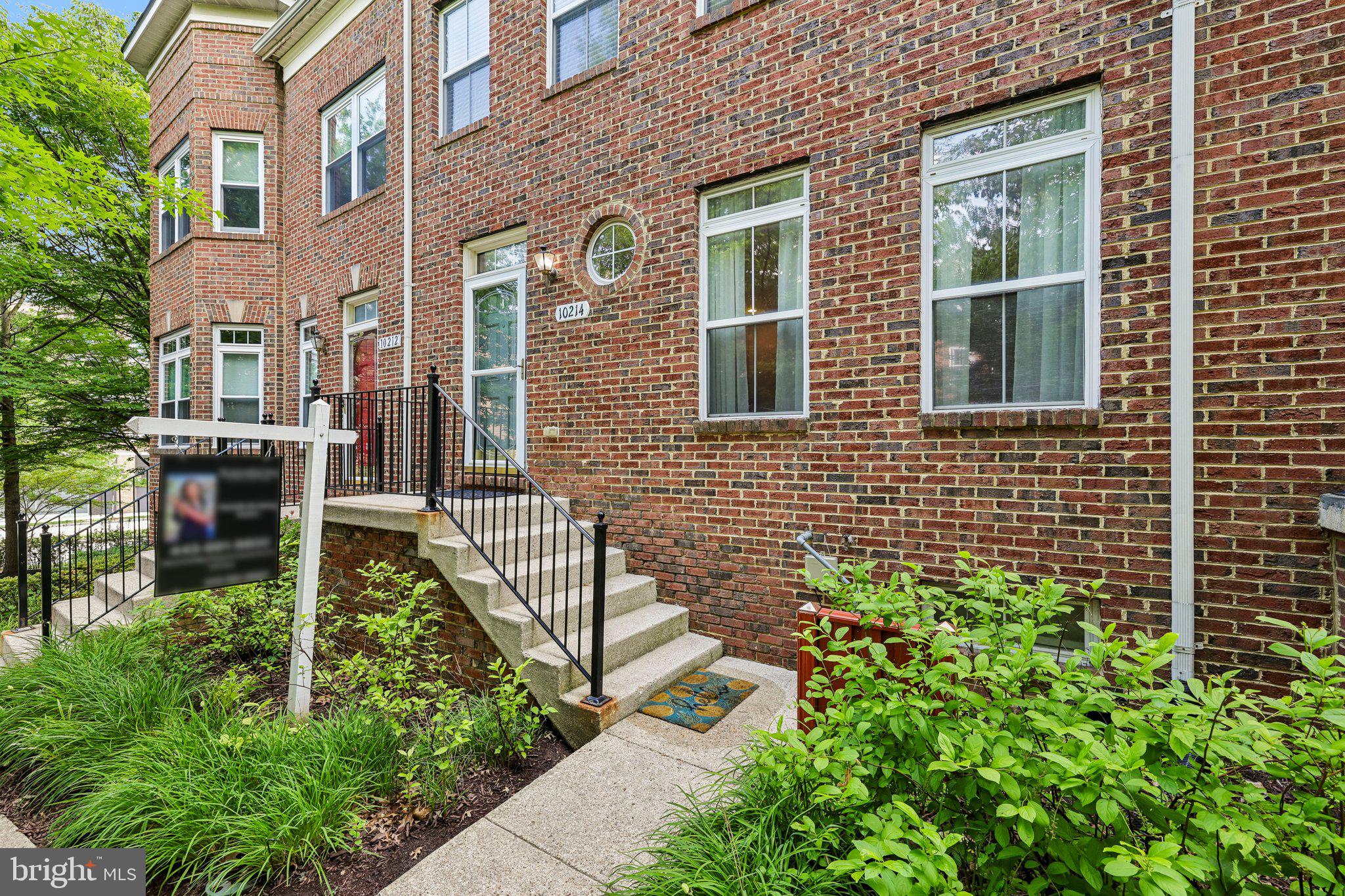 Experience refined living in this exceptional brick-front townhome, perfectly positioned in Columbia’s coveted Governors Grant community. Thoughtfully designed across three beautifully finished levels, this elegant residence seamlessly blends sophisticated style, everyday comfort, and an unbeatable location.
The heart of the home is a beautifully appointed kitchen featuring rich 42-inch cherry cabinetry, Corian countertops, an expansive breakfast bar, and generous workspace—ideal for everything from casual mornings to effortless entertaining. The sun-filled main level welcomes you with soaring ceilings, elegant crown molding, recessed lighting, and a cozy gas fireplace that creates the perfect setting for relaxing or gathering with family and friends.
Escape to the luxurious primary suite, where vaulted ceilings, a spacious walk-in closet, and a spa-inspired en-suite bath with dual vanities, a soaking tub, and a separate shower offer the perfect private retreat. Two additional bedrooms, an updated hall bath, and an upper-level laundry room provide both comfort and convenience for family and guests.
The finished lower level offers exceptional flexibility, making it the perfect home office, fitness studio, media room, or guest retreat, complete with a convenient half bath and direct access to the oversized two-car garage.
Enjoy a truly walkable lifestyle just moments from The Mall in Columbia, Merriweather Post Pavilion, Toby’s Dinner Theatre, premier dining, boutique shopping, parks, and miles of walking trails, with easy access to major commuter routes.
Meticulously maintained and thoughtfully updated, this home offers exceptional peace of mind with a new roof (2026), both HVAC systems replaced (2024), gas water heater (2024), dryer (2025), and dishwasher (2026).
Offering timeless elegance, modern updates, and an unparalleled location, this is more than a home—it’s a lifestyle.