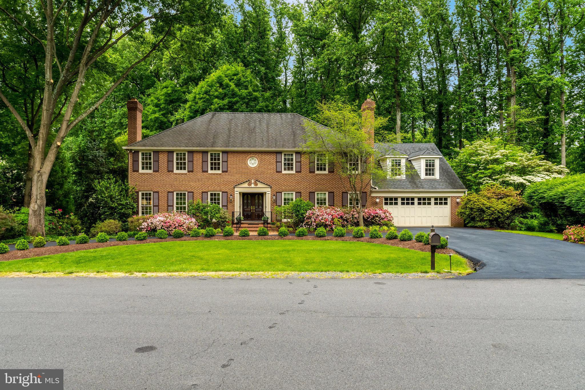 Timberly, an enclave of 50 brick homes on expansive, private lots surrounded by mature trees in a park-like setting. Timberly is located just outside the beltway in close proximity to downtown McLean, the heart of Tysons corner, and only minutes from the Silver Line Metro. Timberly also has access to parkland and walking trails that take you to adjoining neighborhoods, Spring Hill Rec Center, plygrnds, & sprts flds. This community's neighbors take pride in their neighbrhd.  They have an online & printed neighbrhd directory to promote community interaction.
This charming all brck center-hall Colonial will  welcme you w/ its exquisite lndscping and circular drivwy.  Home was built by Ken Seidel, Stratton Construction (1976) & is beautifully sited on over a .50 lot that is almost perfectly square.  Deck overlooks a very prvte & quiet settng.  Beyond the prprty is Tmbrly Prk, a Fx Cnty Prk w/ a meandering stream.  Residnce has over 5000 fished sqr ft of living space on 3 lvls that has been meticulously maintained by the ognal owners.  Hrdwd flrs are on almost the entire main fr (excpt the Ktchn, lndry rm, & pwdr rm).   Hrdwd flrs throughout the uppr ll (excpt a small section of the Sitting Rm, 3 bthrms up & the bonus rm) & in the LL Rec Rm & Game Rm.  
The marble-floored foyer is open to the main staircase & flnked by the Livng Rm on the left & the FR on the right. The LR has a natural wd brning firplce w/ mrble hearth & detailed moldings.  Just off the Lvng Rm at the far end is a lovely formal Office w/ an entire wall of built-in bookcases & files.  Also off the Lvng Rm is the frmal Ding Rm w/ detailed molding & a window/dr wall allowing views of the incredible bckyrd. The Dinng Rm leads into the large gourmet Ktchn. Ktchn has 12x12 ceramic tile, Ktchen Aid appliances that include a 48” Fnch panel refrigerator w/ access to the ice & water outside the dr.  Kitchen also has a Thermador 5 burner dwndrft cktop w/ a snless-stl pot filler in the backsplash. Features in this lovly ktchen are the heated flr, ht water dispenser by the under mounted double sink w/ garbage dspsal for each of the sinks.    Kitchen also includes a U-line wine refrig, built-in microwave, & a lrge brkfst rm w/ wall mounted TV which conveys. Brkfast area leads to the Lndry Rm, which is off the garage & includes a rear staircse to the bonus rm above the garge. Landy m has a GE washer & dryr w/ a utility sink w/ ample built-ins for strge. Off laundry rm is the lrge 2 car garge w/ built-in cabinetry & a profesnlly installed, extmely durable epoxy flr.  To the right of the foyer is a lovely Famly Rm w/ an all brick, floor to ceiling wood burning firplce that has been convrtd to gas & a granite wet bar area.
The rear stairs in the Laundry Rm conveniently accesses the upsrs Bonus Rm abve the garge.   Pass through the Bons Rm via a secret dr concted to one of the walk-in closts in the Primry Bedrm. Once you’re up to the Uppr Lvl, the Primry Ste area is expanve w/ a Sitting Rm that may be convrted bck to an addtinal bedrm upstars, en-suite luxry Primry Bathrm, his & her walk-in closts, two vanitis, a framlss extra-lrge glss shwer, an upgradd theraptic soaking tub, a privte water closet commde area & a lrge linen closet. Rest of the uppr lvl includs an additinal 2 full hll bths w/ privte tub & commde areas & 3 additional bedrooms, 1 of them having a full-size walk-in closet.
Lowr levl offers a lrge Rec Rm w/ an all-brick natural burnng wd firpce that has been converted to gas & an entire wall of custom built-ins bkcass.  Adjacent to the Rec Rm is a lrge Gme Rm that also incldes a full wlk out to the surreal bckyrd & patios. On the lower levl is a second kitchen th at was grandfatered in & apprvd by Fx Cnty.  The kitchen was updated w/ grnite cntertps, GE rnge, dshwsher, under mnted snk w/ grbage disposl, & a GE refrigerator. Additinal legal 5th bdrm w/ a walk-in closet & a full bth, as well as an unfinshed spce w/ a trmendous amnt of storage, built-in shelving .