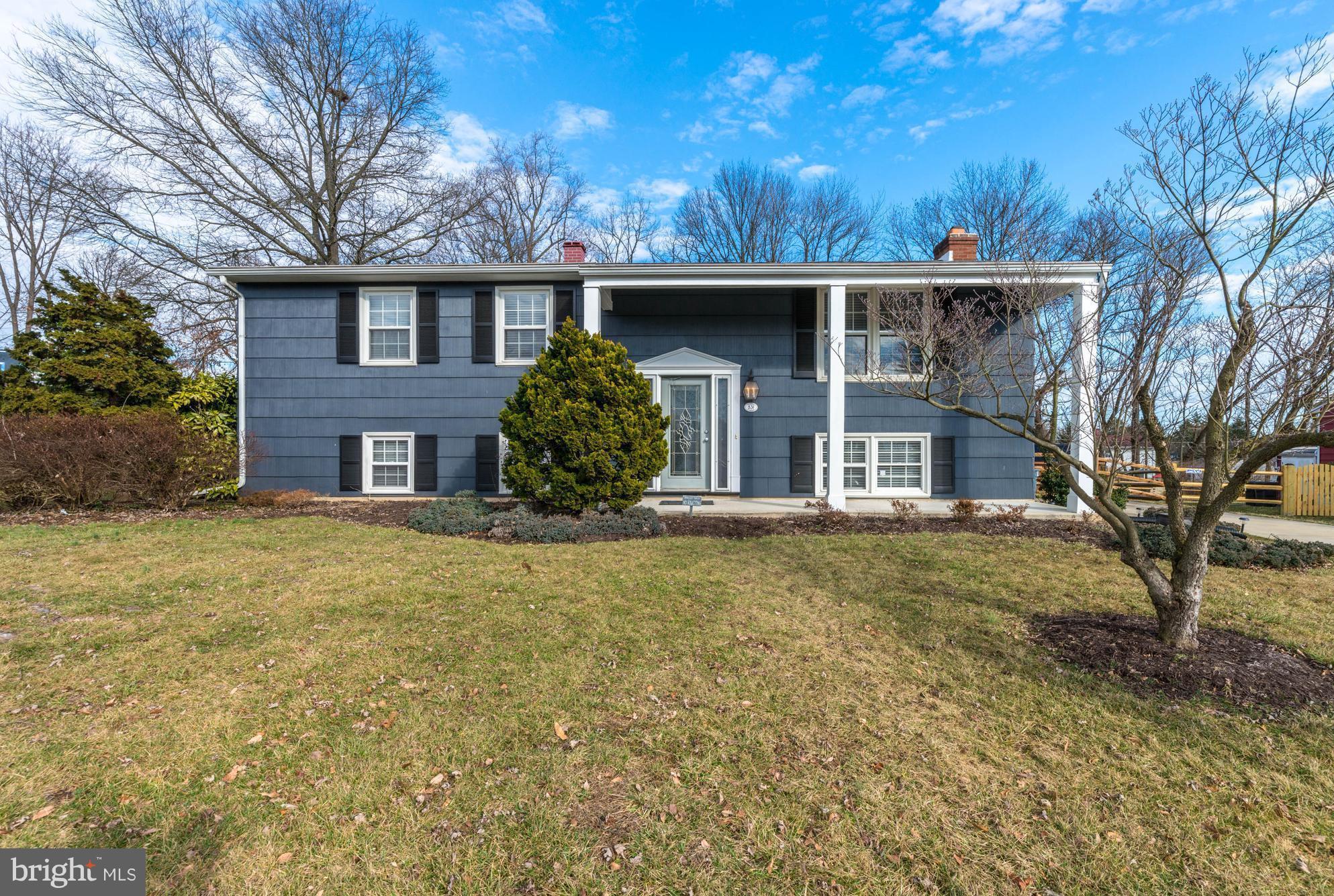 Fabulous Split in the Popular Tallwood Community! Sunny Living Room w/Hardwood Floors Opens to Totally Renovated Kitchen w/New Cabinetry, Hardwood Floors, Granite Counters, SS Appliances, Island w/Breakfast Bar* Adjacent Dining Area w/Door to Expansive Deck Overlooking Large Fenced * Updated Baths* LL Family Room w/Fireplace & Wet Bar* Updated Electrical*Move-In Condition!