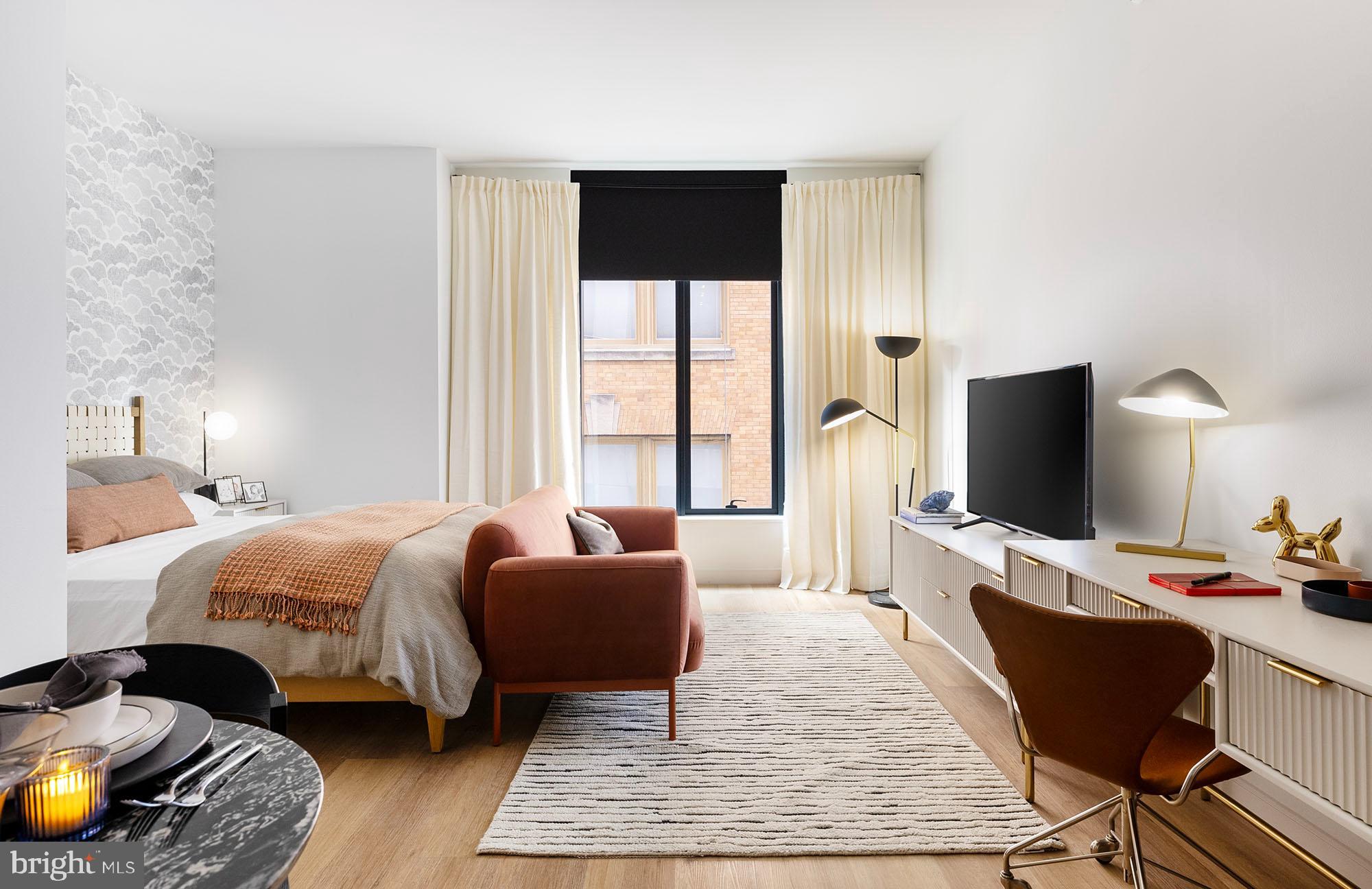 Center City’s Crown Jewel: 210 South 12th. A once-in-a-lifetime opportunity.
Nestled in the vibrant heart of Midtown Village, 210 South 12th stands as a beacon of modern living, embodying an unparalleled residential experience. This prestigious address is renowned for its sophisticated living spaces, which include everything from sleek studio apartments to expansive three-bedroom penthouses and everything in between.

The stunning architecture of 210 South 12th was finely crafted by a team of elite design professionals headlined by award-winning firm RSHP, formerly known as Rogers Stirk Harbour + Partners, Midwood Design Studio, and BLT Architects. World-class elegance combines with the character and soul of one of America’s most vibrant cities to create 32 floors of innovative living.

Located within the Washington Square West neighborhood, this apartment community integrates modern design and convenience into every element, offering studio, one-bedroom, one-bedroom den, and two-bedroom apartments as well as impressive three-bedroom penthouses. Residents are greeted with a 24-hour attended lobby with concierge services, providing a welcoming entrance. At  210 South 12th, you’ll enjoy personalized comfort year-round thanks to state-of-the-art air conditioning and keyless entry with smart controls. 

Cycling enthusiasts will love the ample bike storage. And those with a competitive spirit will revel in a recreational haven complete with billiards, ping pong, and shuffleboard. When you’re ready for a quiet retreat, visit the cozy library aside the fireplace overlooking a living green wall, catering to both literary pursuits and relaxation.
 
The dynamic co-working lounge is tailored for modern professionals, while breathtaking distant views encompass bridges, the river, and the city skyline as a visual retreat. The community includes a dedicated dog park and spa, ensuring that furry residents are well cared for. 

Additional bragworthy amenities enhance convenience, including a 100% EV-equipped fully automated parking garage, a smart package room for secure deliveries, resident storage lockers, a spin studio, a yoga room, sauna, and a state-of-the-art fitness center.
 
Dining is elevated to an art form with an exquisite gourmet catering kitchen and a poolside lounge with its own catering equipment. Outdoor amenities create a resort-like atmosphere with a pool, sunbathing areas, a sundeck, and an outdoor cinema. 

For private gatherings and business meetings, spaces like dining rooms, meeting rooms with wet bars, and conference rooms are designed to accommodate your needs. 

210 South 12th Street caters to the diverse needs and interests of its residents, transcending traditional apartment living and setting a new benchmark for luxury, comfort, and design in Philadelphia's Center City.
 
* Photos are of model units ** Pricing and availability subject to change on daily basis ** Parking may be available for additional fee **