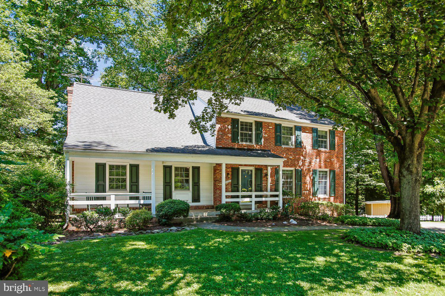 Welcome to 11303 Hounds Way, tucked away on a cul-de-sac in the sought after Old Farm neighborhood. This beautifully refreshed 5 bedroom 3.5 bath colonial is the one you have been waiting for! Step inside from the covered front porch into the inviting foyer. To your right, you will find a sunny living room with built-ins and a large separate dining room. The open concept kitchen boasting granite countertops, stainless steel appliances, gas cooking, countertop peninsula seating, an island, and a desk area flows seamlessly into the family room. Here you will find a cozy fireplace with a wood burning insert and a walkout to the Trex deck overlooking the beautiful back yard. To the left of the front door is a large office with built ins. A half bath completes this level. Upstairs, this home boasts a spacious primary bedroom with en suite bathroom with double sinks, soaking tub and spa like shower. Adjacent to the primary bedroom there is a walk-in closet with abundant storage space! Down the hall, the home features three well-sized bedrooms that share a hall bathroom with double sinks and tub/shower combo. The upper level includes the laundry room with full size washer and dryer plus storage.  The walkout lower level of this home features a large bedroom and full bathroom, recreation area, entry to oversized one car garage, large finished storage area, and a separate walk out to the private back yard. The Old Farm neighborhood enjoys a prime location close to restaurants, shopping, and access to 270, as well as an active voluntary Civic Association with events throughout the year. Farmland Elementary, Tilden Middle School, and Walter Johnson High School.  Don't miss out on this amazing home!
