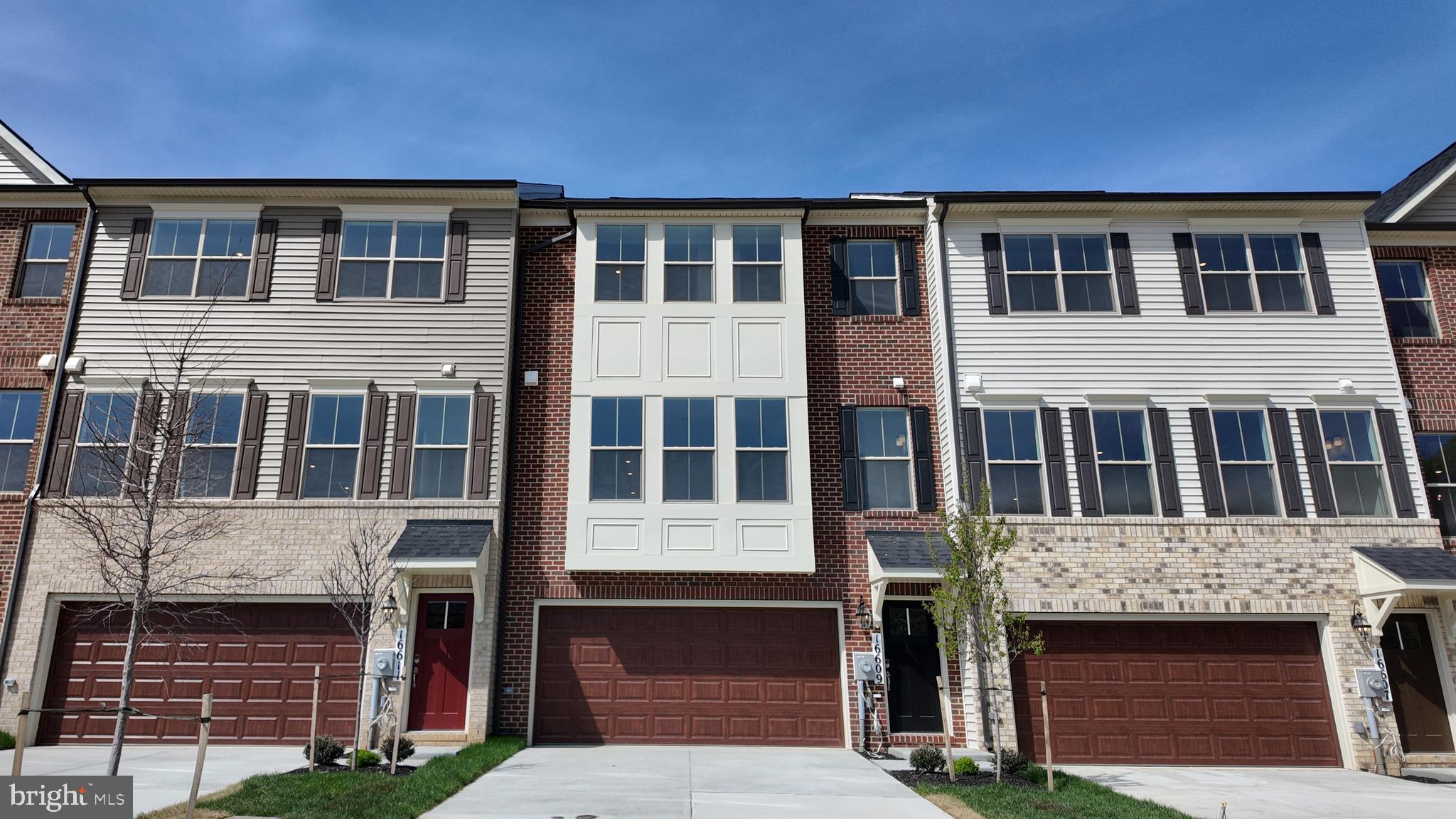 Welcome to this newly built Patuxent floorplan at 16609 Aruba Drive, located at our new Manning Square Towns community in Accokeek, Maryland. 

Step up to this home and you'll be welcomed by a brick front exterior, two‑story bay window, and a welcoming front entry canopy. Inside, a finished lower level recreation room with an additional full bathroom greet you. Stepping up to the next level, you can experience the open layout that provides ample space, perfect for everyday living and entertaining. The great room features an electric fireplace built into the wall, great for enjoying cozy evenings in with your family. The kitchen includes stone countertops, a stainless steel appliances, and pendant lighting over an expansive island.

 Upstairs, the primary suite offers a full en-suite bathroom with included walk-in closets. The upper level is completed by two additional bedrooms and one additional full bath. With premium flooring, oak stairs, and energy‑efficient features, this home delivers exceptional value and appeal in the desirable Manning Square Towns community.
Interior photos are of a similar plan and are for representation only - Contact Caruso Homes for more information.
