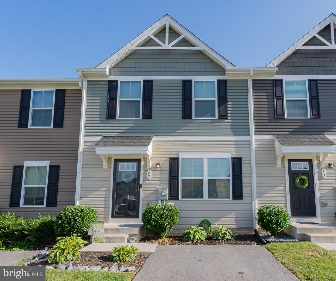 Welcome to this beautiful three-level townhouse located in the highly sought-after Stonecrest neighborhood—just minutes from schools, shopping and with quick access to I-81 for easy commuting. Built in 2020, this modern home features 3 bedrooms, 2 full bathrooms upstairs, and a convenient half bath powder room on the main level.

The open-concept main floor includes a well-designed kitchen with black appliances, a dining area and an island that creates a great, functional workspace for cooking and entertaining.

The mostly finished lower level offers amazing flexibility, including a nearly complete fourth bedroom and a bonus flex room. With the simple addition of a ceiling, the space can be fully finished to fit your needs—whether it’s a home office, guest suite, or playroom.

Step outside from the walk-out lower level to a fully fenced backyard—ideal for kids, pets or simply enjoying your own private outdoor space.  Enjoy the convenience of a paved driveway, and the bonus of community overflow parking located directly across from the home—perfect for guests. With modern features, versatile space, and an ideal location, this Stonecrest townhouse has it all!