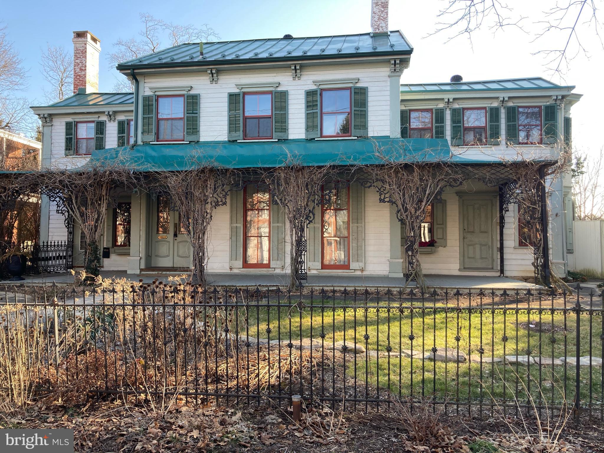 Own a piece of Carlisle history with this hidden gem! This 4,370 square foot home sits on .51 acres of land. Not something you find in downtown Carlisle often! The charm in this home is like no other! From the original hardwood floors to the 5 fireplaces, to the crown molding, this home offers so much character. The home includes main house and 2 apartments or could use as one entire house. The possibilities are endless and could even be a Bread and Breakfast. The house has 3 bedrooms and 2.5 bathrooms. The first floor apartment is a 2 bedroom and the second floor apartment is a 1 bedroom. Both apartments are 705 square feet! There is a huge fenced in backyard, rear patio, balcony overlooking the yard, and awesome front porch! This home has a ton of personality and is just waiting for its new owners! Homes like this do not come around often!
