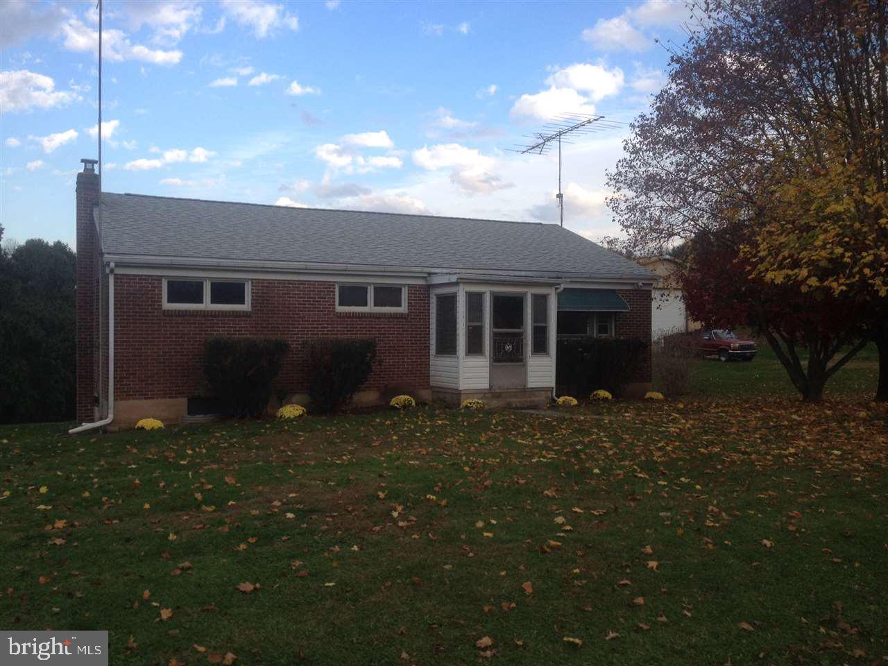 This a great home for a first time home buyer or the couple looking to downsize to a rancher. All original Hardwood floors. Great pull in garage in the basement. Roof was installed in 2010, shed was just repainted, nearly a half acre, located well between York and Hanover.