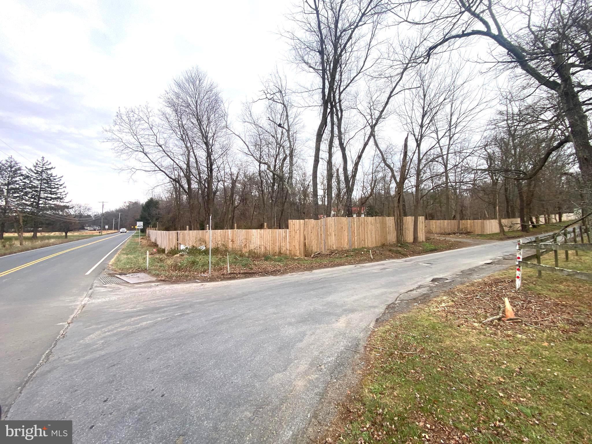 This land isn't going to last long, there are 2.3 acres available in Montgomery County, a beautiful flat, wooded lot located on the corner of Damascus Rd and Howard Chapel Rd. A fence and wood chips have been placed along the property's perimeter. Buyers will be responsible for their due diligence in obtaining any/all information regarding their intent and potential use of the parcel and verifying with the county land access to the well and septic.