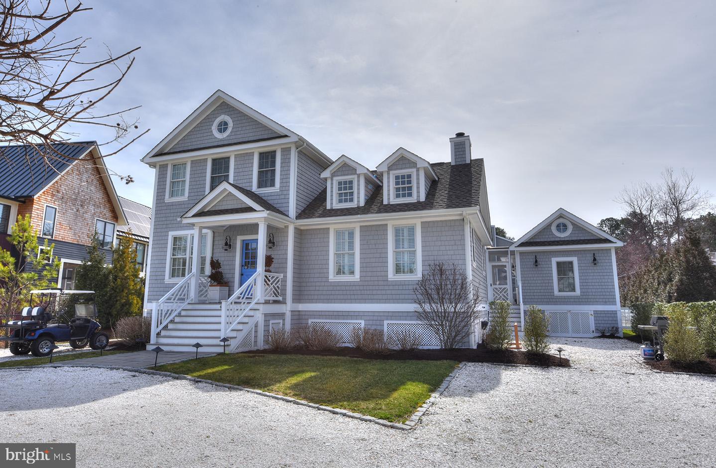 Coastal cottage built in 2013 in the highly desired community of North Shores. Excellent floor plan consisting of 5 bedrooms, 4.5 baths, gourmet kitchen with island that opens to a large great room with vaulted ceilings and wood-burning fireplace. Separate guest suite that doubles at a pool cabana is perfect for entertaining. Exterior features include a screened porch, outside shower, in-ground swimming pool and nicely landscaped yard.
