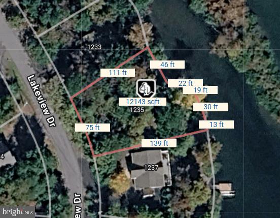 Unbelievable opportunity to own one of the few remaining buildable waterfront lots in this highly sought-after 24/7 gated lake community! Enjoy endless amenities including boating, water skiing, a fishing pier, sports courts, dog parks, a clubhouse with fitness room, and three sandy beaches. Conveniently located just 20 minutes from Winchester and 90 minutes from DC, this community is truly the area’s hidden paradise.Don’t miss your chance to secure an affordable piece of lakefront living—opportunities like this are rare! Buyers may apply for a personal-use dock through the HOA, subject to approval and guidelines. Marina boat slips are available separately and assigned by lease. Water and sewer hookups are available through Aqua for a current total cost of $5,000.