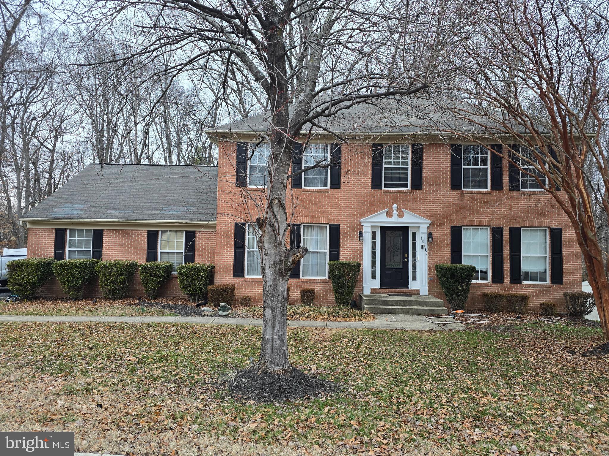Welcome to this beautifully maintained brick-front colonial home in the Marlboro Woods community that offers a perfect blend of comfort and style. With 4 spacious bedrooms, 2.5 bathrooms and a formal dining room, it's designed for both relaxation and entertaining. The interior features an open floor plan with hardwood floors, generous room sizes and a cozy fireplace in the family room. The heart of the home features a bright family room with fireplace that flows seamlessly into the kitchen, complete with an inviting island.  The lower level offers flexibility with space for entertainment.  Being sold AS-IS - Closing cost assistance available.