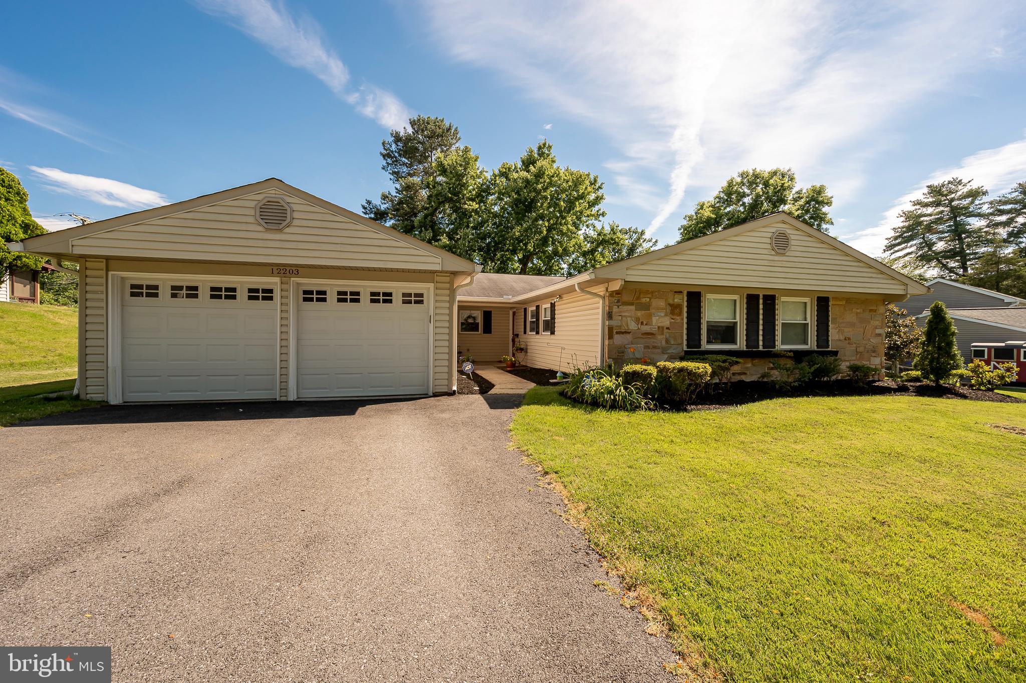 Two-hour notice required.  Sold As-Is. You'll appreciate this charmingly updated 3 bedroom, 2 bath rambler in the Foxhill subdivision of Bowie with 2018 square feet of living space.  Two car garage converted into expansive family room with woodburning stove, brick surround, hardwood flooring and tray ceiling that opens directly to the kitchen and breakfast area.  Plus, a two-car garage has been added.  Expanded bedroom affords so many possibilities; - perfect for office, nursey, craft area, etc.  Wood floors, updated bathrooms, vinyl siding, newer windows, patio and shed.  Relax in the fenced backyard on the patio with a pastoral view of  Foxhill Park and seasonal view of Woodland Pond.  HVAC 2018, Water Heater 2022.  Updates include roof, electrical panel, kitchen appliances & tile flooring, panel doors throughout.  You won't want to miss this one!
