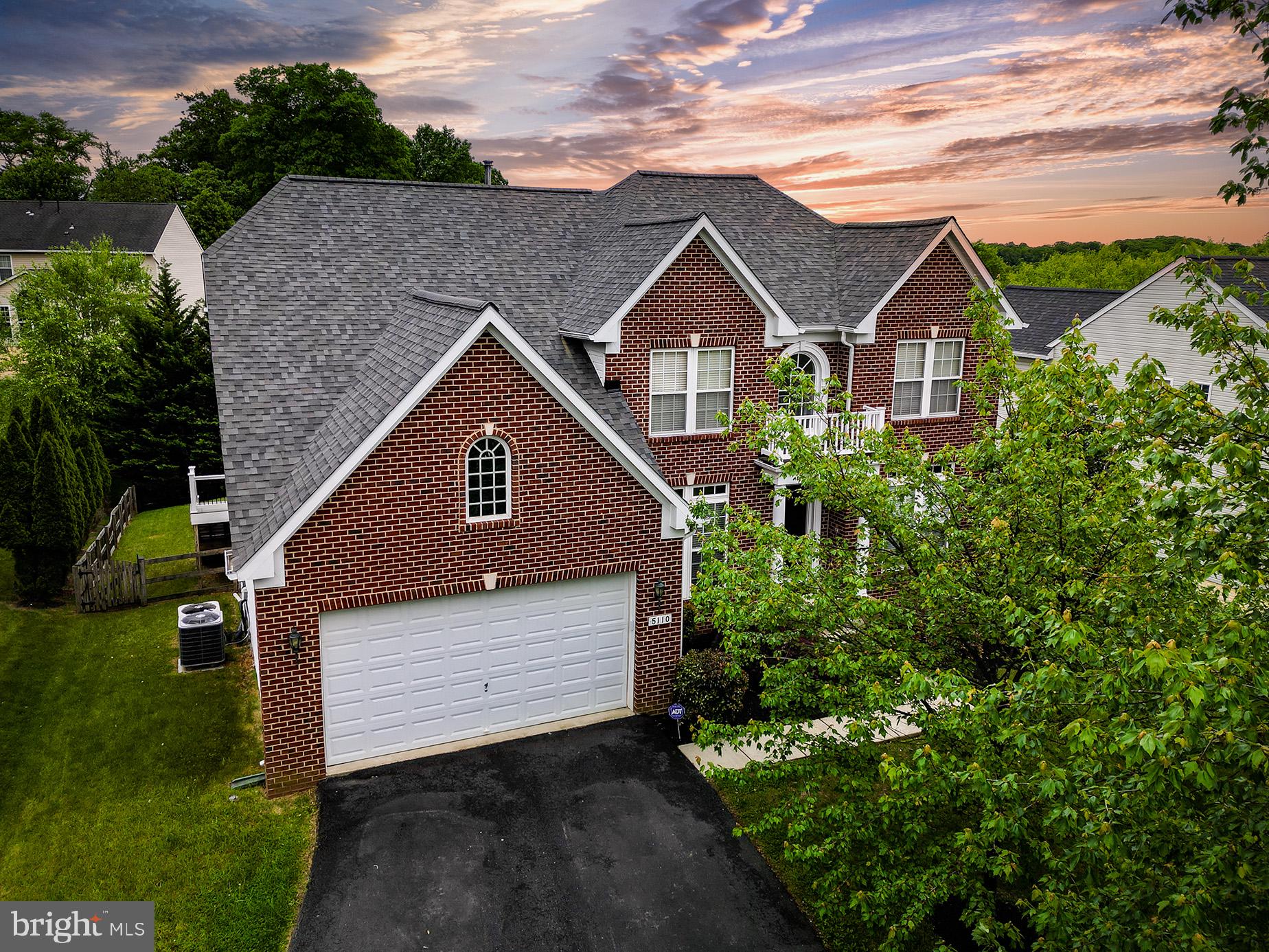 Beautiful brick-front Colonial in desirable Ellicott City featuring 4 bedrooms and 3.5 baths. This spacious home offers a resort-style backyard complete with a built-in heated saltwater pool and a separate hot tub, perfect for relaxing or entertaining.The updated kitchen features freshly painted cabinetry with new hardware, stainless steel appliances, granite countertops, a center island, and a sunny breakfast area. Just off the kitchen, the inviting family room showcases a stunning stone fireplace, while the formal separate dining room provides the perfect setting for gatherings and special occasions. Refinished hardwood floors flow throughout, complemented by fresh paint on the main and upper levels and upgraded carpet in the main level office and upstairs.The spacious primary suite includes a walk-in closet and private ensuite bath. Convenient bedroom level laundry adds to the home’s functionality. The fully finished walk out basement offers additional living and entertaining space, including a versatile bonus room ideal for a guest room, home office, or gym. Complete with a 2-car front-loading garage and driveway, this home combines comfort, style, and convenience in a sought-after community.