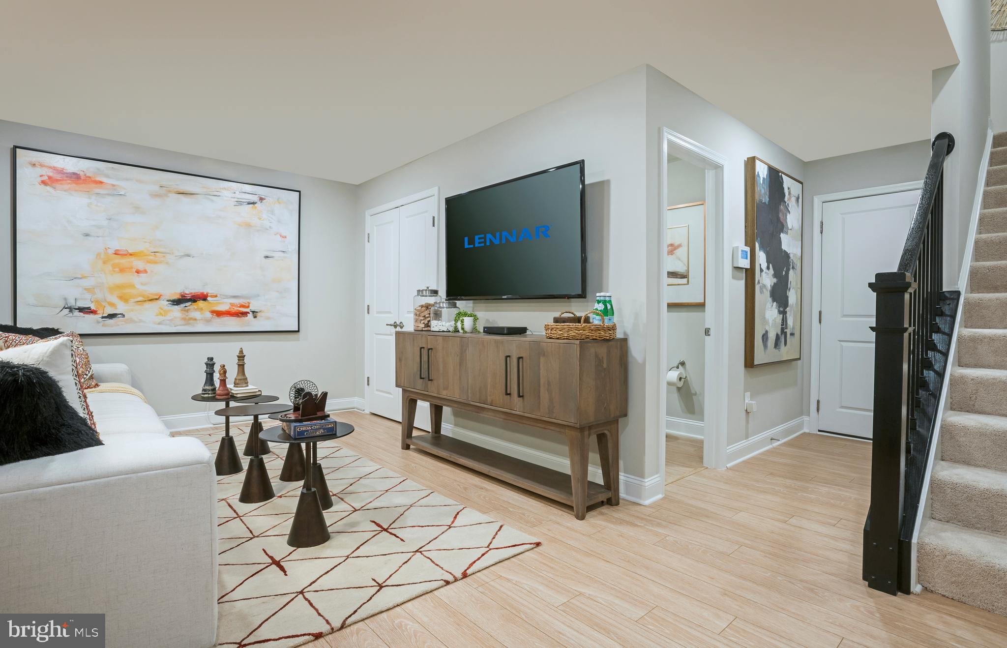 The Yards at Oxford Square. A LEED Certified community with top rated ES and MS in the community along with 1.5 miles of walking trails, community center, pool with fitness center, Little Eggs Childcare Center and Baltimore Coffee & Tea Shop within walking distance of every homesite and free community shuttle to Marc Train.  4 Bedrooms, 3.5 Baths, 2 Car Garage, 8x18 Maintenance Free Deck, Wide Plank Flooring on First Floor and Entire Main Level, Rear Gourmet Kitchen with Double Wall Oven, 5 Burner Gas Cooktop, Stainless Steel Appliances Including SxS French Door Refrigerator with Bottom Freezer, Kitchen Backsplash, Quartz Kitchen Countertops, Granite Vanity Tops in all Full Baths, Window Blinds Throughout and Front Load Washer/Dryer.  Closing Cost assistance available with the use of seller's preferred lender.