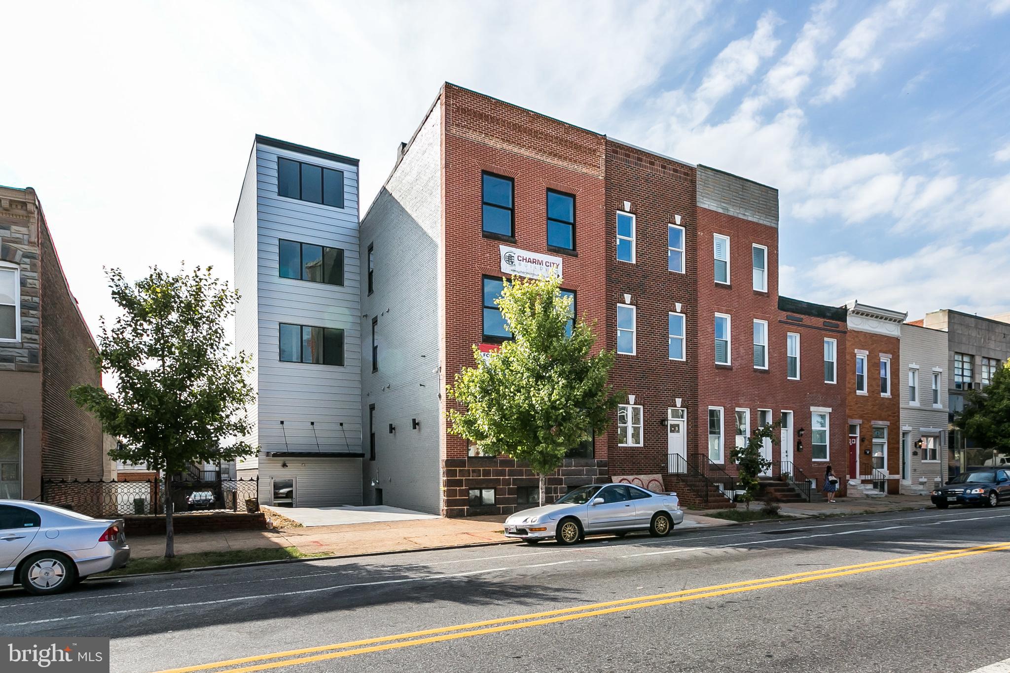 STUNNING RENOVATION WITH PANORAMIC VIEWS OF PATTERSON PARK & DOWNTOWN WITH 1 ASSIGNED PARKING SPACE - located just steps to Patterson Park & Canton this large 1200 sq ft apartment features an open floor plan w/ large kitchen, ss appliances, quartz counters & spacious living room/dining room. This unit offers 2 bedroom suites each w/ their own full bath and parking, pets case by case - available May 1st!