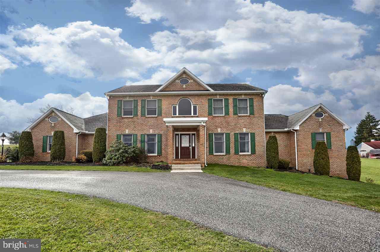 If it's space you need, this one has it! Your own private hilltop retreat w/ near 4000 sq ft, beautiful scenic views included.  All brick exterior on cul-de-sac street. Enjoy the large eat-in kitchen overlooking the patio and pool area. 1st floor Master Suite w/ gas FP & huge walk-in closet. 1st floor office, Central Vac, Oversized 3 car GAR, Lg walkout base waiting to be finished. You'll want to see this one- call today for your private showing!