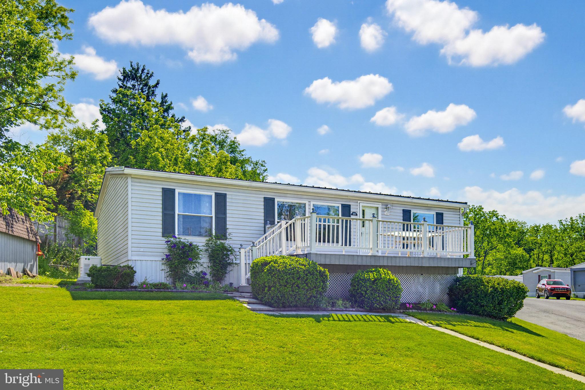 Welcome to easy, affordable living in this well-maintained 2001 double-wide home located in a small, friendly 55+ community in Annville. Tucked away in a peaceful setting, yet conveniently located near shopping, dining, healthcare, and major roadways, this home offers the perfect blend of comfort and convenience.  Inside, you'll find 3 bedrooms and 2 full bathrooms, along with fresh updates including new carpeting in several rooms. The spacious layout provides plenty of room to relax and entertain, while the included appliances make moving in a breeze. The kitchen comes equipped with a like-new stainless steel gas range and stainless steel refrigerator, and a washer/dryer combo is also included.
Recent improvements include newer windows installed over the past few years, a new water heater, and a durable metal roof, providing added value and peace of mind. A whole-house generator and large 500-gallon propane tank offer additional comfort and convenience year-round.
Enjoy your morning coffee or unwind at the end of the day on the inviting deck while taking in the quiet surroundings and welcoming neighborhood atmosphere. If you're looking for low-maintenance living in a peaceful 55+ community with reasonable lot rent, this move-in-ready home is one you won't want to miss.
