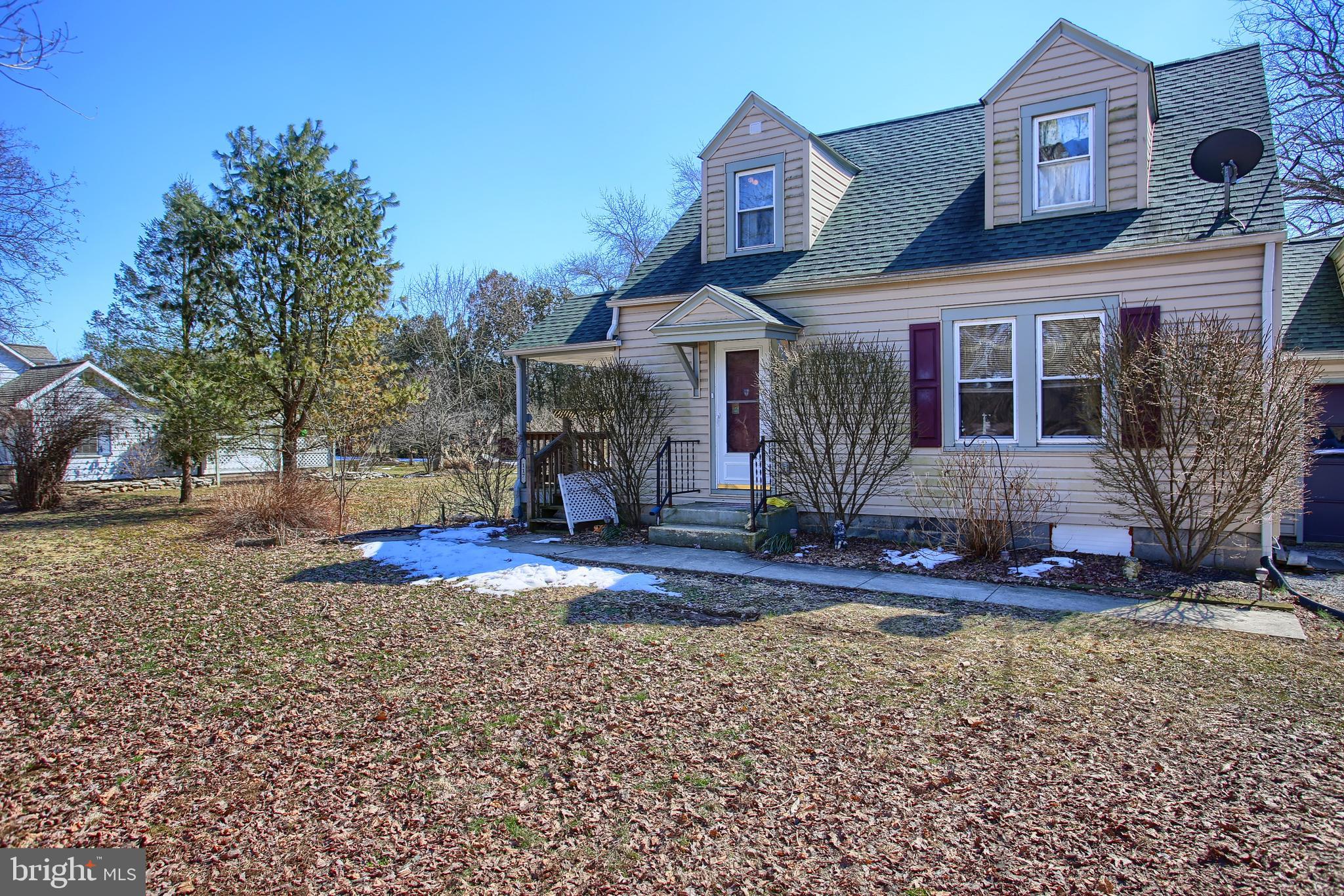 Coming Soon for Showings by March 11, 2019.    House renovated to include: new roof, new wiring throughout house, addition of 1st floor bath & laundry area, screened sun porch, painted & new ceilings on 1st floor. New furnace in basement. In 2008 new large deck added. In 2005 all new vinyl siding. Home has gorgeous landscaping, with many trees and flowers, including a circular brick patio garden, small fish pond, and storage/garden shed with partially fenced yard.Home is situated on a double lot for extra privacy. Lovely landscaping and garden areas. Style is a quaint Cape Cod cottage with many original features, such as glass door knobs. Neighborhood is nice and quiet rural area. The house faces many trees, immediate field & farm area, and the beautiful Yellow Breeches is accessible just down the street a bit for excellent trout fishing. Our yard is frequently visited by local wildlife.  Lovely landscaped yard and garden provides a haven for many bird species as well. A nature lovers' paradise!