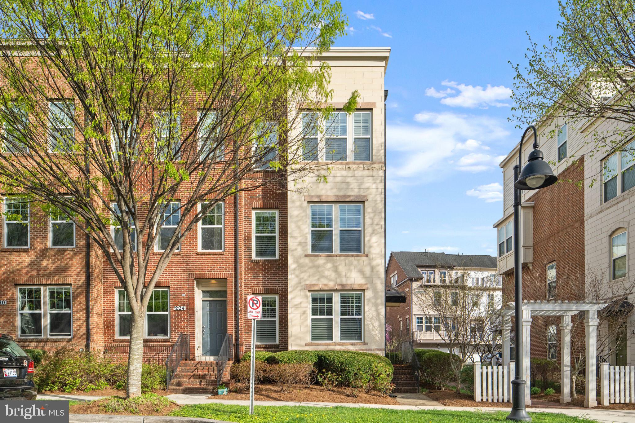 Experience elevated living in this stunning contemporary end-unit townhome, ideally situated in the highly desirable Crown Farm community. Boasting an attached garage, private rooftop deck, and an exceptional array of high-end upgrades, this home seamlessly blends modern design with everyday comfort.

The heart of the home is the show-stopping designer kitchen, thoughtfully appointed with striking quartzite countertops, premium Thermador appliances, custom cabinetry, and a spacious breakfast bar—perfect for casual dining or entertaining. The open-concept layout flows effortlessly to a private rear deck, creating an ideal indoor-outdoor lifestyle. Rich quarter-sawn white oak hardwood flooring, elegant plantation shutters, and smart sensor lighting add warmth, sophistication, and convenience throughout every level.

Retreat to the luxurious primary suite, featuring a generous walk-in closet and a spa-inspired bath complete with marble flooring and sleek, contemporary finishes. The versatile fourth level offers the ultimate flex space—ideal as a family room, recreation room, or guest retreat—along with a third bedroom, updated full bath, and access to the expansive rooftop deck, perfect for relaxing or entertaining under the stars.

The entry level welcomes you with beautiful travertine tile and an additional full bath, offering flexibility for guests, a home office, or multi-generational living.

Located in one of the best spots in the community, you’re just steps from Downtown Crown, where vibrant dining, shopping, and entertainment options await. Enjoy the convenience of a complimentary shuttle to the Metro, along with quick access to I-270, the ICC, and Shady Grove Metro.

Residents of Crown Farm enjoy resort-style amenities, including a pool, community center, tennis courts, playgrounds, and more.

This is a rare opportunity to own a truly exceptional home in one of the area’s most sought-after communities—don’t miss it!