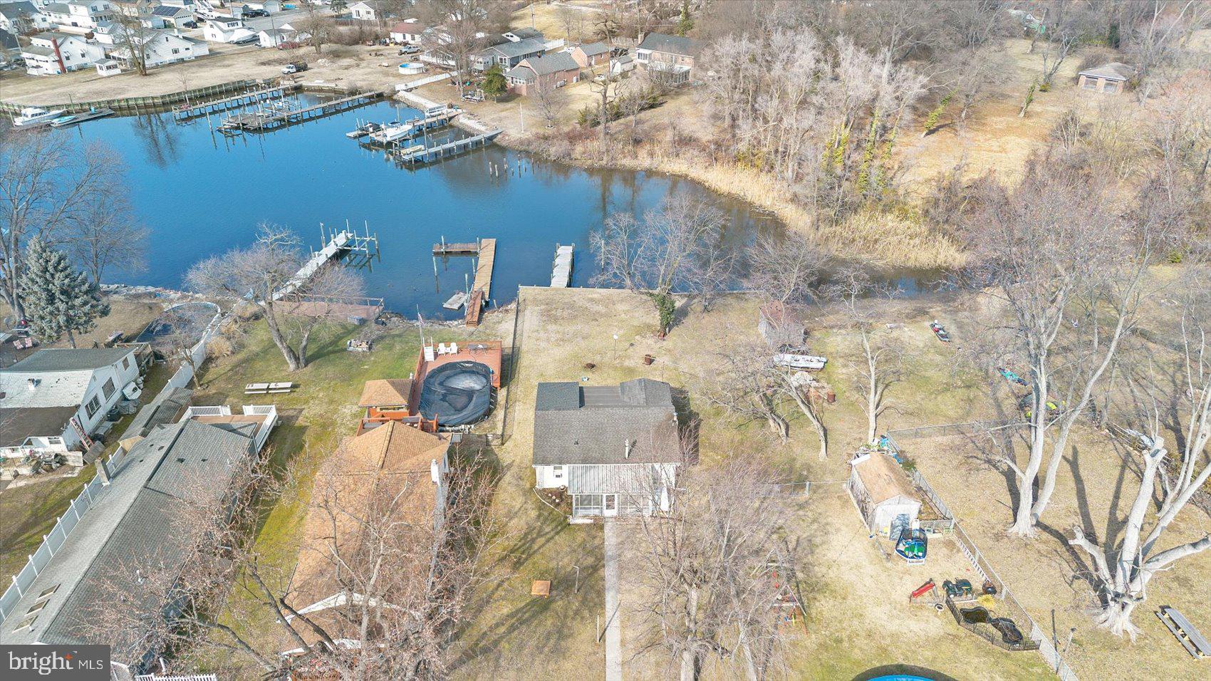 Welcome Home to 7508 Battle Grove!  This waterfront gem has so much potential!  Walk outside and see the beautiful views of the water on your private dock!  The main level offers an open concept layout featuring 3 Bedrooms, 1.5 Bathrooms, Kitchen, dining area, screened in porch and MORE!   Unfinished basement offers endless possibilities!  This home is being sold in AS-IS Condition.  Book your private showing today before it's gone!!
