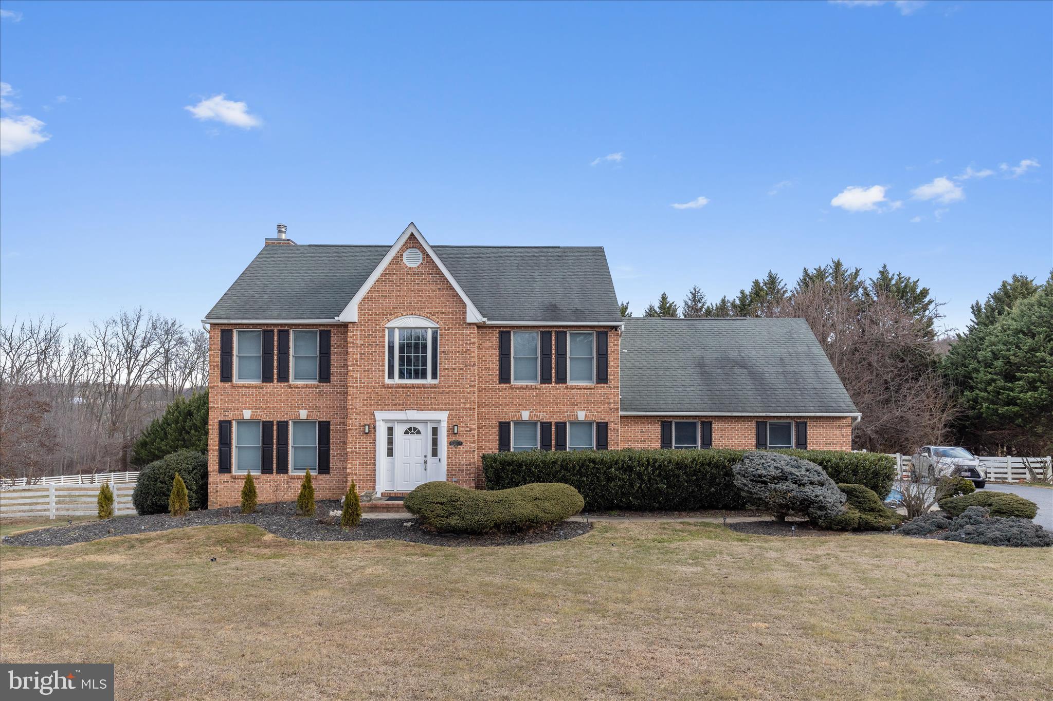 Welcome to 2111 Warren Way in Westminster — a classic brick-front colonial offering 4 bedrooms, 2 full baths, 2 half baths, 3,460 square feet, and no HOA, all set on a 2-acre lot. Inside, you’ll find bright, refreshed living spaces, hardwood floors, a stylish white kitchen with island seating, and a formal dining area that works beautifully for everyday living or entertaining. The home blends timeless curb appeal with a clean, updated interior feel, giving buyers the space, function, and flexibility they want. Offered at $720,000, this is a strong opportunity for buyers looking for room to spread out without sacrificing comfort or style.