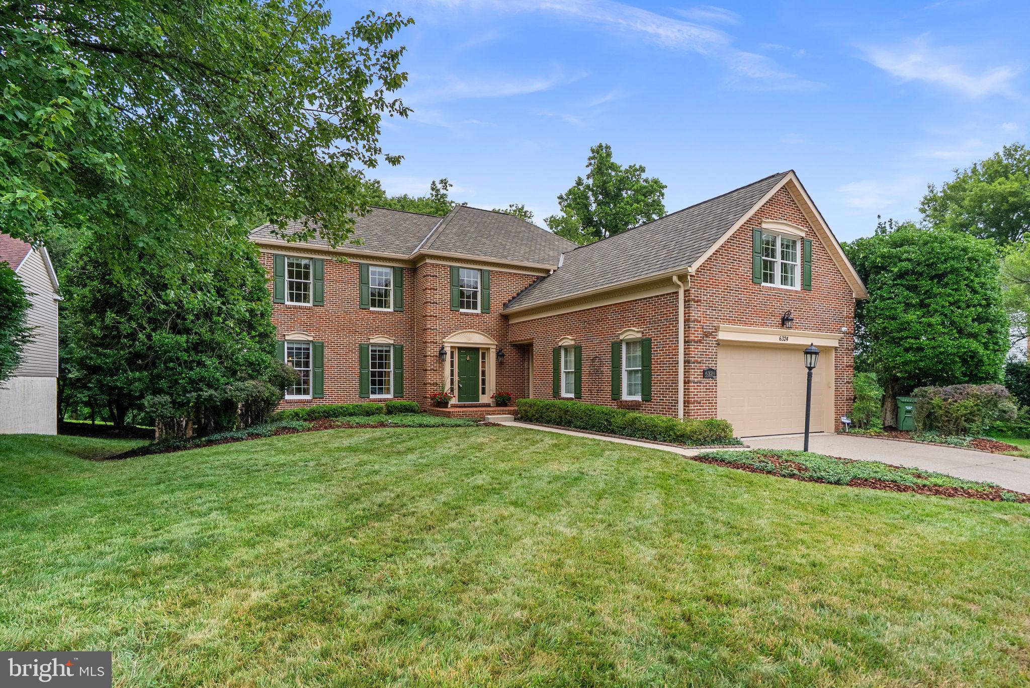 Welcome to this pristine Colonial, perfectly situated on a picturesque lot in the highly sought-after Village of River Hill. Thoughtfully updated throughout, this exceptional home showcases over $125,000 in stunning kitchen renovations, along with extensive upgrades including all four beautifully remodeled bathrooms, updated flooring, custom millwork, fresh paint, recessed lighting on all three levels, and countless additional enhancements. // Step inside the welcoming foyer, where Brazilian teak hardwood flooring extends throughout most of the main level. The thoughtfully designed main level offers a spacious formal living room, an elegant formal dining room, a  warm and inviting family room with a full wall of custom built-ins and a marble-surround gas fireplace, and a well-appointed office/study featuring custom-painted built-ins, three desk areas, and granite countertops. A mudroom with updated flooring and built-in storage adds everyday convenience, while the remodeled full bathrooms (2026) feature custom cabinetry, luxury brass Kohler fixtures, Taj Mahal quartzite countertops, a premium porcelain tile shower, and porcelain flooring. // Beautifully remodeled in 2026, the gourmet eat-in kitchen showcases custom inset cabinetry finished in Sherwin-Williams® Greek Villa, Taj Mahal quartzite countertops and matching backsplash, premium porcelain tile flooring, a center island, Professional JennAir® stainless steel appliances, to include a 36” range with hood, 42” built-in refrigerator, and double microwave/oven wall combo, brass hardware, and a bright breakfast room. // Upstairs, the owner’s suite offers a private ensuite bath with a custom-painted vanity topped with granite, a granite tub surround, a travertine tile shower with glass enclosure, travertine flooring, and brass fixtures. Four additional bedrooms, including a finished room over the garage, provide ample space, while two remodeled full bathrooms feature updated vanities and flooring (2026). A conveniently located laundry room completes the upper level. Oak hardwood flooring runs throughout the bedroom level, four bedrooms feature wainscoting, and every bedroom closet has been enhanced with custom Elfa® shelving and drawer systems. // The fully finished walk-out lower level expands the living space with a spacious recreation room featuring Brazilian cherry hardwood flooring, wainscoting, custom built-ins, and a large finished storage closet with Elfa shelving, along with two unfinished storage areas. // Outdoor living is equally impressive with a spacious deck, 20’ x 20’ flagstone patio surrounded by extensive stonework and professional landscaping, a newly fenced backyard, wooded views, and updated exterior lighting. // Additional highlights include a recently installed Certainteed luxury shingle roof and gutters, with roof backed by a fifty -year warranty, two high-efficiency gas furnaces and air conditioning systems, a recently installed gas tankless water heater, a water softener, security cameras, and an updated insulated garage door. // Located in the coveted Village of River Hill, residents enjoy picturesque surroundings, excellent amenities, top-rated schools, and easy access to shopping, dining, recreation, and commuter routes.