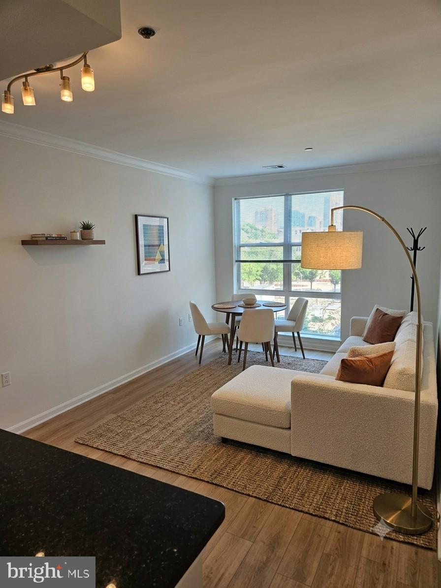 Welcome to affordable waterfront living in the heart of Baltimore’s Inner Harbor. This bright and updated 1‑bedroom condo offers modern finishes, abundant natural light, and unbeatable access to the city’s best dining, entertainment, and commuter routes. Perfect for first‑time buyers, downsizers, or investors seeking strong rental potential in a secure, amenity‑rich community.

Step inside to an open layout with updated flooring, fresh paint, and a spacious living area that flows seamlessly to your private balcony — ideal for morning coffee or evening relaxation. The kitchen features modern cabinetry, stainless steel appliances, and excellent storage. The bedroom provides generous space and a large closet, while the bathroom is clean, well‑maintained, and move‑in ready.

Residents of Pierside enjoy 24/7 security, a fitness center, pool, garage parking, and direct access to the waterfront promenade. Live steps from Federal Hill, Harborview Marina, Camden Yards, M&T Bank Stadium, and countless restaurants and shops. Commuters will appreciate easy access to I‑95, I‑395, and public transit.SELLER INCENTIVE: 2 MONTHS OF CONDO FEES PAID