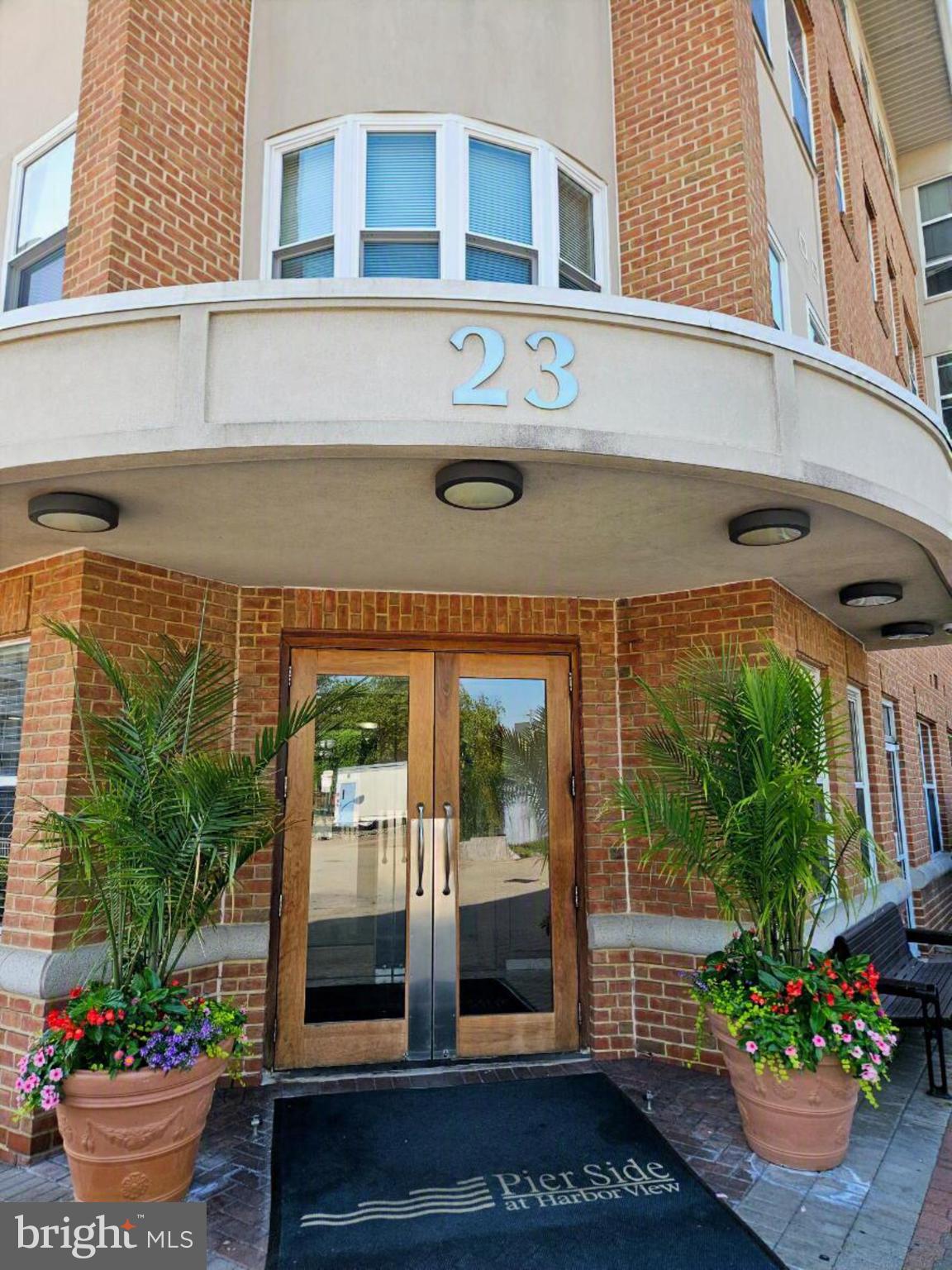 SELLER INCENTIVE: 2 MONTHS OF CONDO FEES PAID! Experience the inviting charm of this 1-bedroom, 1-bathroom condominium in the highly desirable Harborview community of downtown Baltimore. This contemporary mid-rise residence seamlessly blends comfort, convenience, and the allure of waterfront city living. Step into an open-concept living and dining area, thoughtfully designed for both relaxation and entertaining. Expansive windows flood the home with natural light and frame breathtaking views of the harbor and city skyline. Throughout the living space, engineered wood flooring adds warmth and modern sophistication. The well-appointed kitchen features modern appliances—including a built-in microwave, dishwasher, and electric oven/range—making everyday cooking a pleasure. For added convenience, the unit includes a stacked washer and dryer. Residents benefit from a suite of community amenities: 24-hour concierge service and monitored security, an outdoor swimming pool, a fully equipped fitness center, and beautifully maintained common areas. Additional highlights include one assigned parking space in a secure detached garage, as well as access to professionally maintained grounds. Set in vibrant downtown Baltimore, this home is just steps from waterfront dining, shopping, entertainment, and Inner Harbor attractions. Embrace the ideal blend of urban convenience, stunning waterfront views, and resort-style living in this exceptional Harborview condominium.