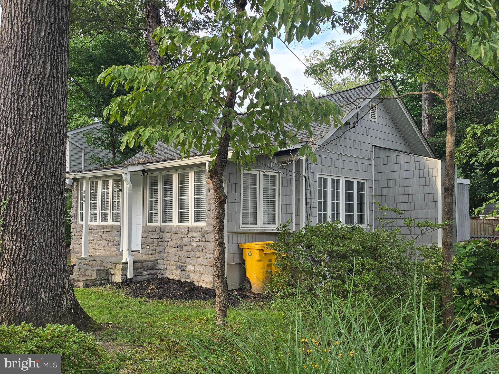 Whether you're ready to stop renting, simplify your lifestyle, or invest in real estate, this charming cottage in Herald Harbor is the perfect opportunity!

Move right into this cozy 2-bedroom, 1-bath home, thoughtfully designed for easy, low-maintenance living without sacrificing comfort. Sunlight pours in through the many windows, filling the home with natural light and creating a warm, inviting atmosphere while showcasing the peaceful natural surroundings.

Step outside to your private, fully fenced backyard—an ideal retreat for relaxing, gardening, or entertaining. Enjoy gatherings on the spacious deck, complete with a built-in bar, making outdoor living a breeze.

For added peace of mind, the home features a brand-new septic system installed in September 2021.

Don't miss your chance to own this delightful Herald Harbor gem, where comfort, convenience, and tranquility come together! Herald Harbor offers a variety of water access, a small beach, and several access paths to drop your canoe in. Walking paths, Boat Ramp w/parking for a nominal fee. Full-size marina just outside of the community, convenience store/pub & Daycare. Community Center available for rentals. Large park maintained by the county.