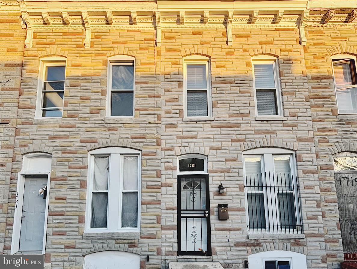 Nestled in a vibrant neighborhood, this charming traditional townhouse offers a unique opportunity to create your dream home. With its classic brick front and cozy interior, this property is a blank canvas awaiting your personal touch. The unfinished basement provides ample storage or the potential for additional living space, while the compact lot size ensures low maintenance, allowing you to spend more time enjoying the community. The surrounding area boasts a rich tapestry of local parks, perfect for leisurely strolls or weekend picnics. Nearby schools are known for their commitment to excellence, making this location ideal for those who value education. The neighborhood is alive with friendly faces and community events, fostering a warm and inviting atmosphere. Convenient on-street parking adds to the ease of living here, while the absence of a homeowners association means more freedom to personalize your space. Embrace the charm of this historic home and the vibrant community that surrounds it!