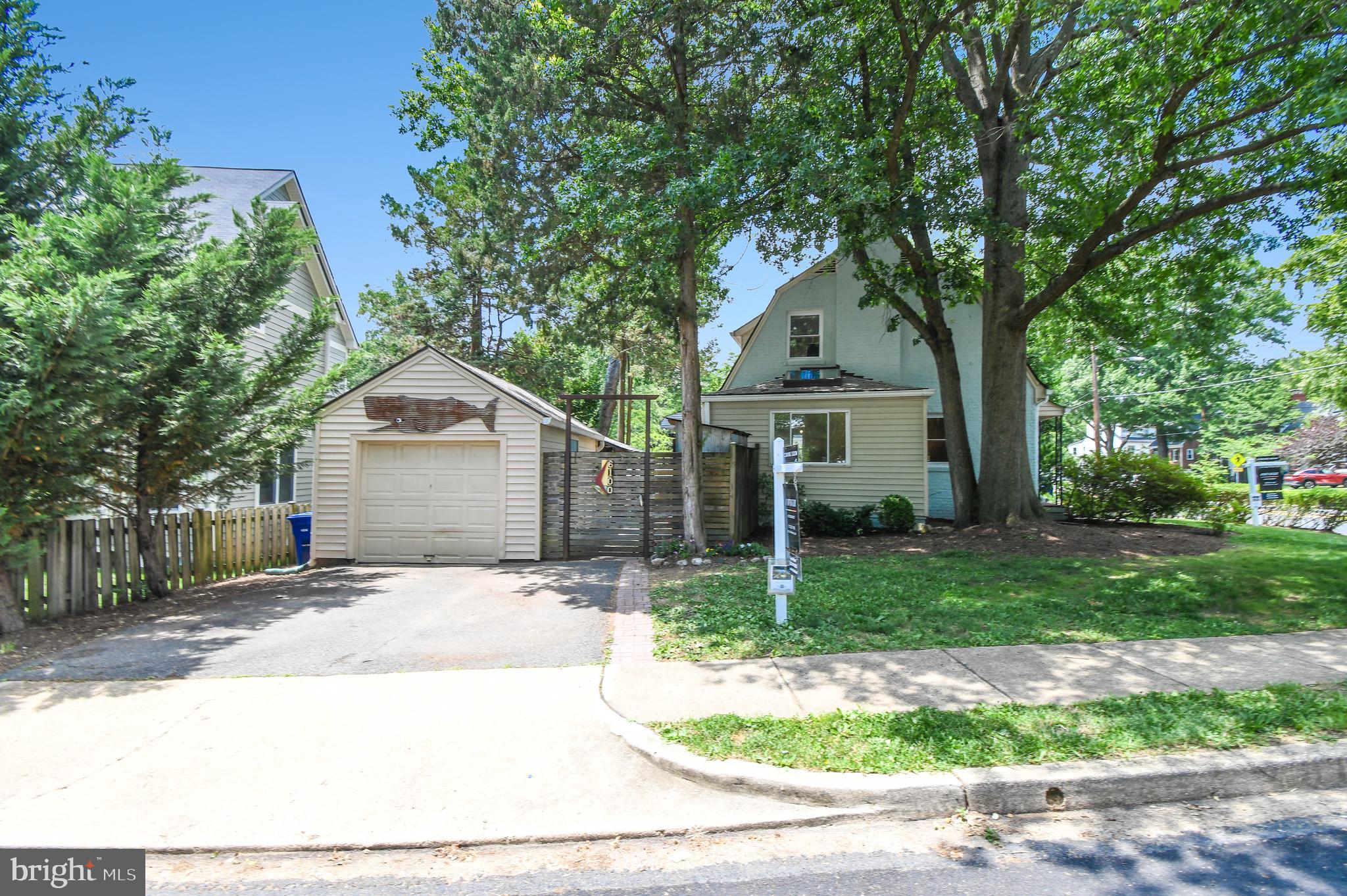 Don’t miss the opportunity to make this one-of-a-kind property your own—just two blocks from Westover Village!

This charming 2-bedroom, 2-bath Colonial sits on a spacious 0.21-acre corner lot and is known throughout the neighborhood for the iconic whale perched above the one-car garage. The seller, a Texas-born metal artist, has infused the property with distinctive custom touches and Western-inspired character throughout. ***Please note: none of the metal artwork conveys.***

A custom ranch-style entry gate, featuring a handle crafted from a 1937 Studebaker hood ornament, welcomes you into a private outdoor retreat. Designed for entertaining, the fully fenced backyard offers multiple patios, including a large brick patio covered by a handcrafted weathered corrugated metal roof.  A lower patio overlooks the expansive yard, complete with a large kayak shed and three additional storage sheds that continue the property’s unique Western aesthetic.

The detached garage is accessible through a side door near the rear entrance to the home and from sliding barn door from the covered patio. The garage features tons of storage shelving and a 100-amp electrical  panel capable of supporting an EV charger. There is space for 2 additional cars on the driveway which is accessed from N Ohio St.

The beautifully landscaped, wide front yard is highlighted by mature trees where you can sit in the shade on the inviting metal bench. The exterior has been recently painted.


Enter from the rear patio into a versatile space that can serve as a mudroom, office, or perhaps a den. Hardwood floors run throughout the main level, where a wood-burning fireplace anchors the living room. The bright dining room features windows on two sides with views of the backyard. The kitchen offers gas cooking,  a front-facing window, and a side door with direct access to the yard—ready for your personal updates and vision.

 The lower level provides a cozy second living area or possible 3rd bedroom with a gas fireplace, built ins and second refrigerator, as well as a full bath, separate laundry room, large storage room and walkout stairs to the backyard.
Upstairs are two bedrooms, with hardwood flooring hidden beneath the carpet plus a bright full bathroom with rain shower and a large skylight. The main bedroom has charming built in drawers and  2 walk in closets, one of which has cedar shelving and drawers. The bright 2nd bedroom has a large sliding window overlooking the gorgeus back yard.

The location is exceptional. Enjoy Westover favorites just two blocks away, including restaurants, shops, the Sunday Farmers Market, and the library. Enjoy eating al fresco while listing to great music at the Westover Market and Beer Garden, grab dinner from Lebanese Taverna, enjoy a taste of NY pizza at the Italian Store or grab a pastry from Village Sweet to take home to eat in your personal outdoor oasis.East Falls Church Metro is less than a mile away,  the W&OD Trail is just a few blocks away and you are minutes from I-66, and Route 267.
A truly special property with endless potential in one of Arlington’s most sought-after neighborhoods.