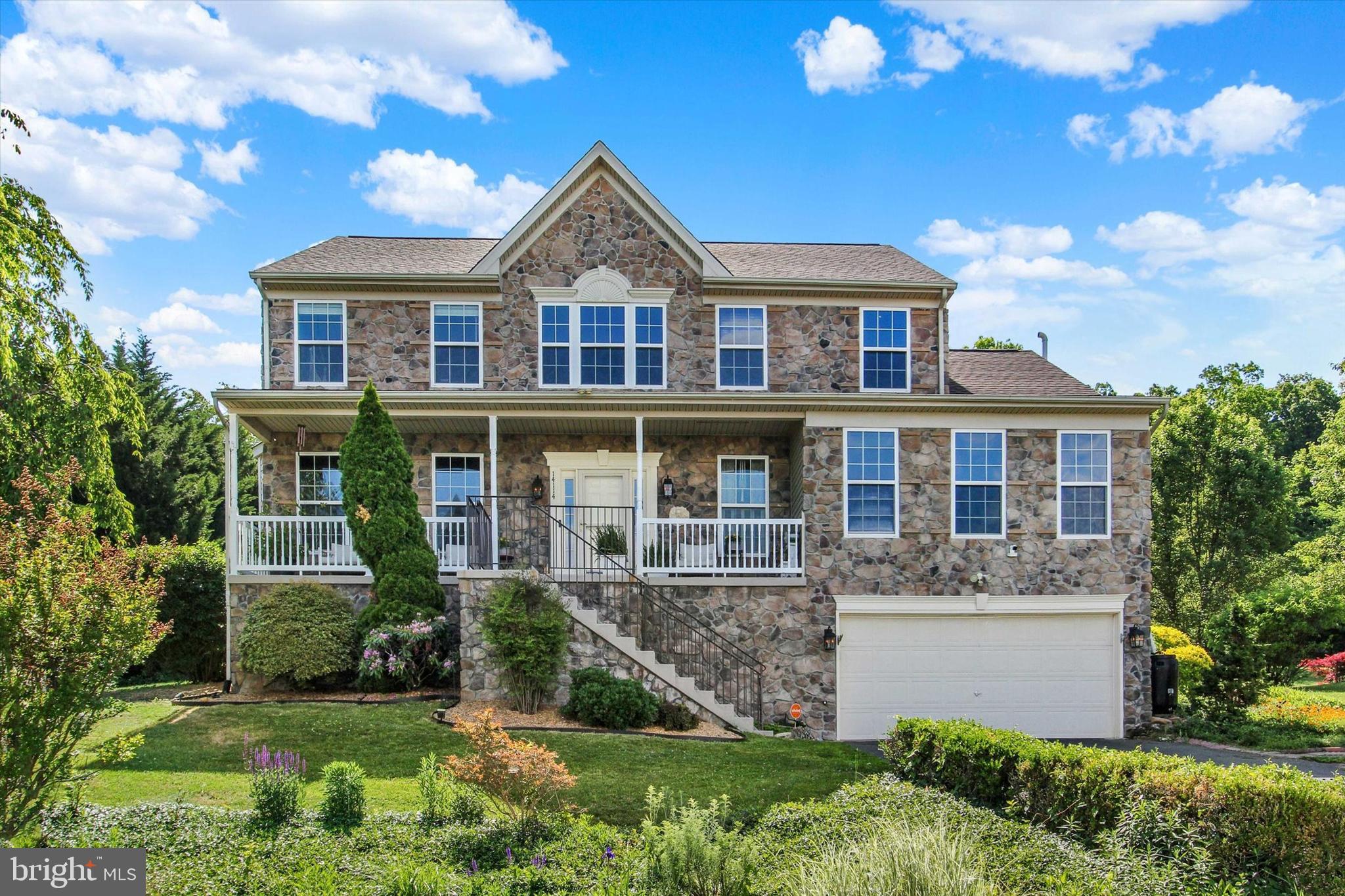 Welcome home! This beautifully maintained colonial offers an abundance of space in a gorgeous rural neighborhood while only minutes from the convenience of Waynesboro shopping and restaurants. The Appalachian Trail and Pen Mar Park are just a hike away! The main level offers an open, flexible floor plan with an island kitchen, stainless steel appliances, two dining areas, a formal living room and family room. A bedroom on the main level, separate laundry room and half bath are just added bonuses to this home's design. Additionally, upstairs, you'll find three large bedrooms, a full bath and an oversized primary suite with a view and adjoining full bath with garden tub. The lower level has been partially finished with plenty of open space for added storage or your personalized finishes. A paved driveway and attached 2-car garage add to the many conveniences of the home. The generous half-acre lot includes the serenity of a waterfall pond and stone patio alongside beautifully established lush gardens and flourishing trees. None of these amazing features will top the breathtaking view of the sunset, Tuscarora mountains and expanding Cumberland valley. Schedule your showing today!