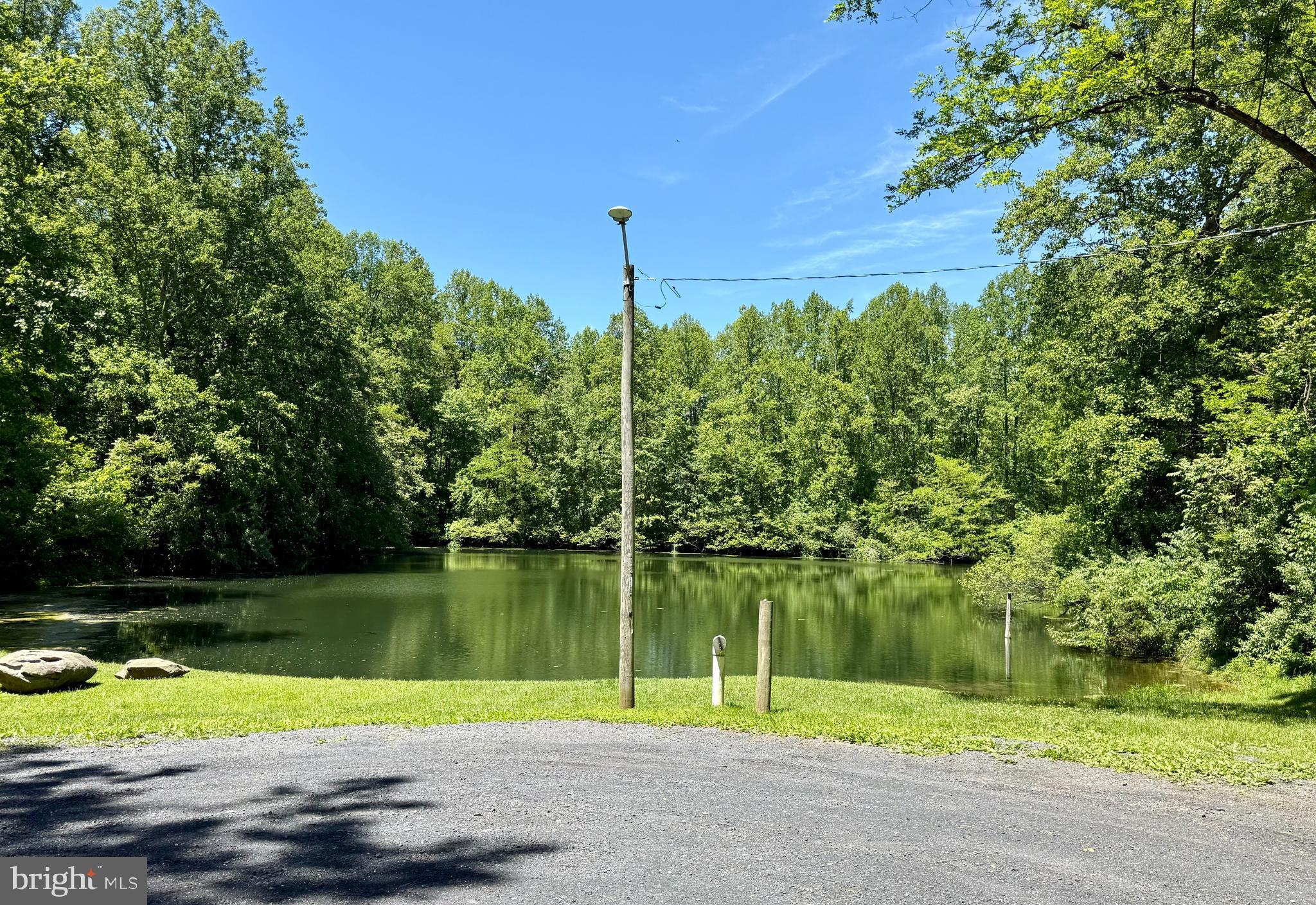 Investor Land Package | 0 Bluebird Way & 0 Oriole Ct, Front Royal | $75,000
Two lots, sold together, 1.2 acres combined. One has the build site, the other has the already-perked septic. That’s the hard work done — you come in, pull permits, and build.
And you won’t be doing it alone. Two houses are already going up on cleared lots right next door. The neighborhood is moving, the proof of concept is already in the ground, and you’re getting in while there’s still value to capture.
The location earns its keep too. Point-O-Woods has its own private neighborhood pond, and you’re minutes from Skyline Drive, Shenandoah National Park, the 4-H Center, and the Smithsonian Conservation Biology Institute. This isn’t just a buildable lot in Warren County — it’s land with a story buyers actually want to live in.
Driveway clearing and culvert installation are planned in the coming days — this one is actively being prepared for its next owner.
Well required. Septic already perked and ready to go.
$75,000 for both parcels. Run the numbers — they work.