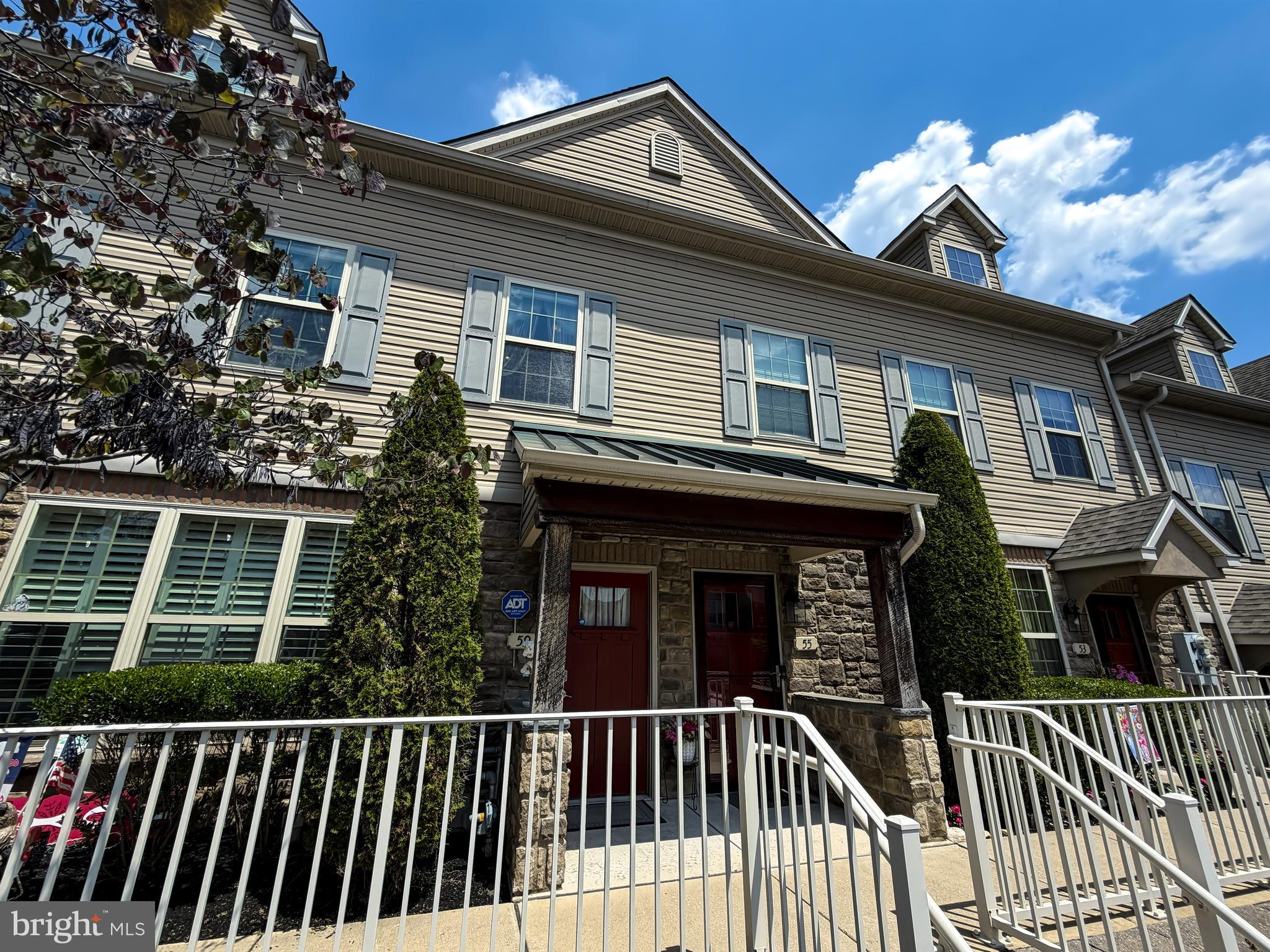 Emerald Walk is a highly sought out MODEL COMMUNITY of upscale townhomes
located in beautiful Bucks County. The demand in this area is exceptionally strong with
close proximity to shopping, restaurants, and major arteries such as Route 1, PA
Turnpike and I-95. Multiple amenities including a community pool & cabana plus
playground area are available to homeowners. 
The home offers an open, spacious floor plan featuring hardwood floors, vaulted ceilings and energy efficient construction. Two ample sized bedrooms are located on the first level. The spacious master bedroom suite includes a master bathroom with double sink and access to a beautiful terrace.
Leading up to the loft is a wrought iron staircase with mahogany wood finish. 
A professionally installed custom home theater occupies the loft for the ultimate movie/gaming experience. In-ceiling mounted surround sound system is further enhanced by a 109” projection screen. The loft spans the entire width of the house and can easily serve as a spacious third bedroom. Multiple facing windows enables an abundance of sunlight to stream into the dining and family room area where a floor to ceiling stone fireplace resides. The kitchen comes complete with a designer glass tile
backsplash, under counter lighting, granite countertops, and spacious island. All
stainless steel kitchen appliances are included as are the washer/dryer combo with
pedestal storage in the laundry area.

Special Features:
•