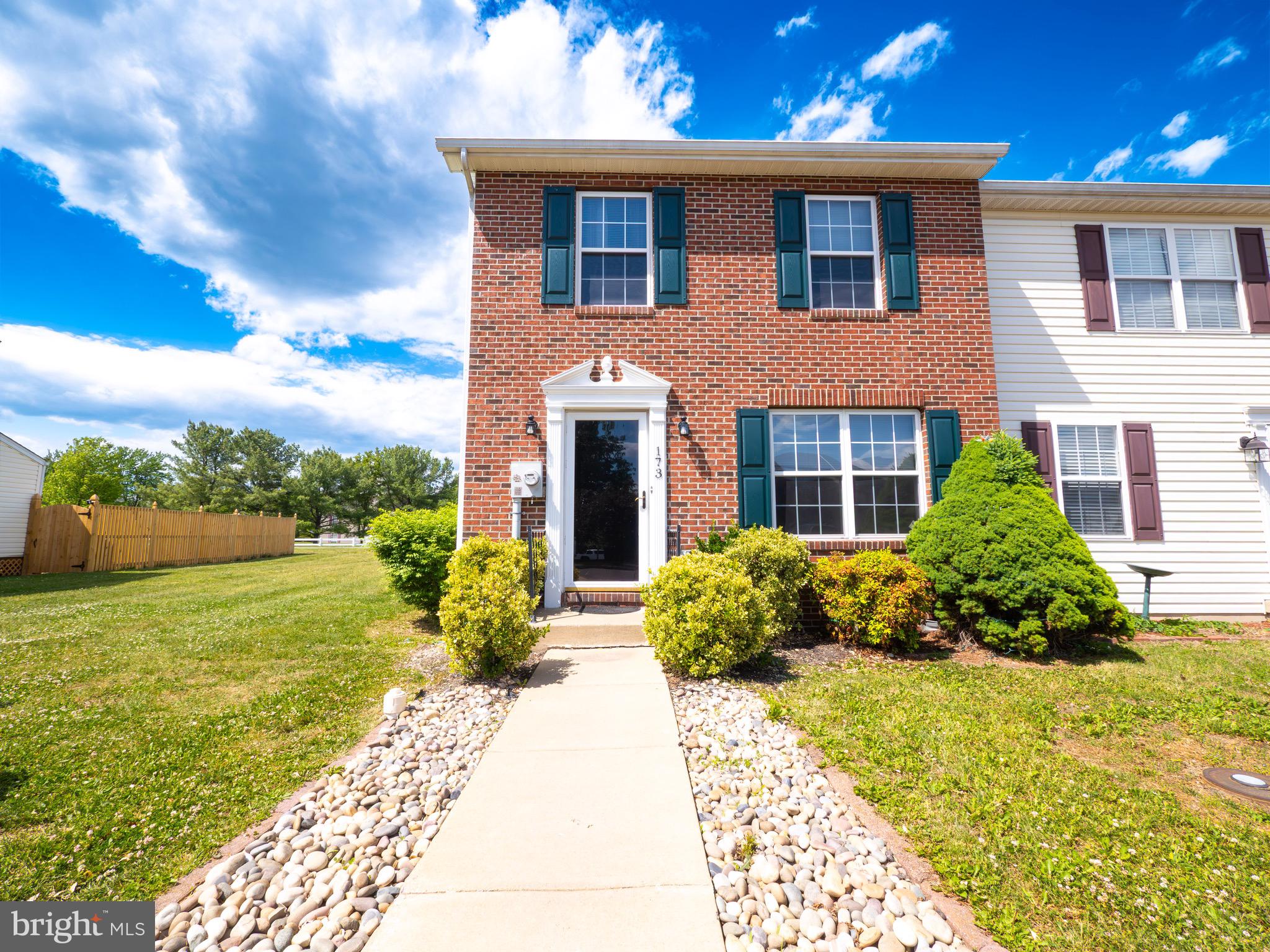 We are back to active at no fault of the seller! 

Welcome home to this beautifully maintained end unit townhome featuring a fully fenced, level backyard perfect for entertaining, pets, or relaxing outdoors.  Step inside to find spacious rooms throughout, including a bright and inviting living room and a separate dining area ideal for gatherings. The oversized primary bedroom offers plenty of space to unwind, while the convenient upper-level laundry makes everyday living easier.  Beautiful wood flooring adds warmth and character throughout the home.  Appliance's convey, and the home is equipped with gas heat and central air for year-round comfort.  Additional vistior parking nearby adds convenience for guests.  Ideally located with easy access to commuter routes, shopping, dining, and everyday amenities.  This move-in ready home is one you will not want to miss!