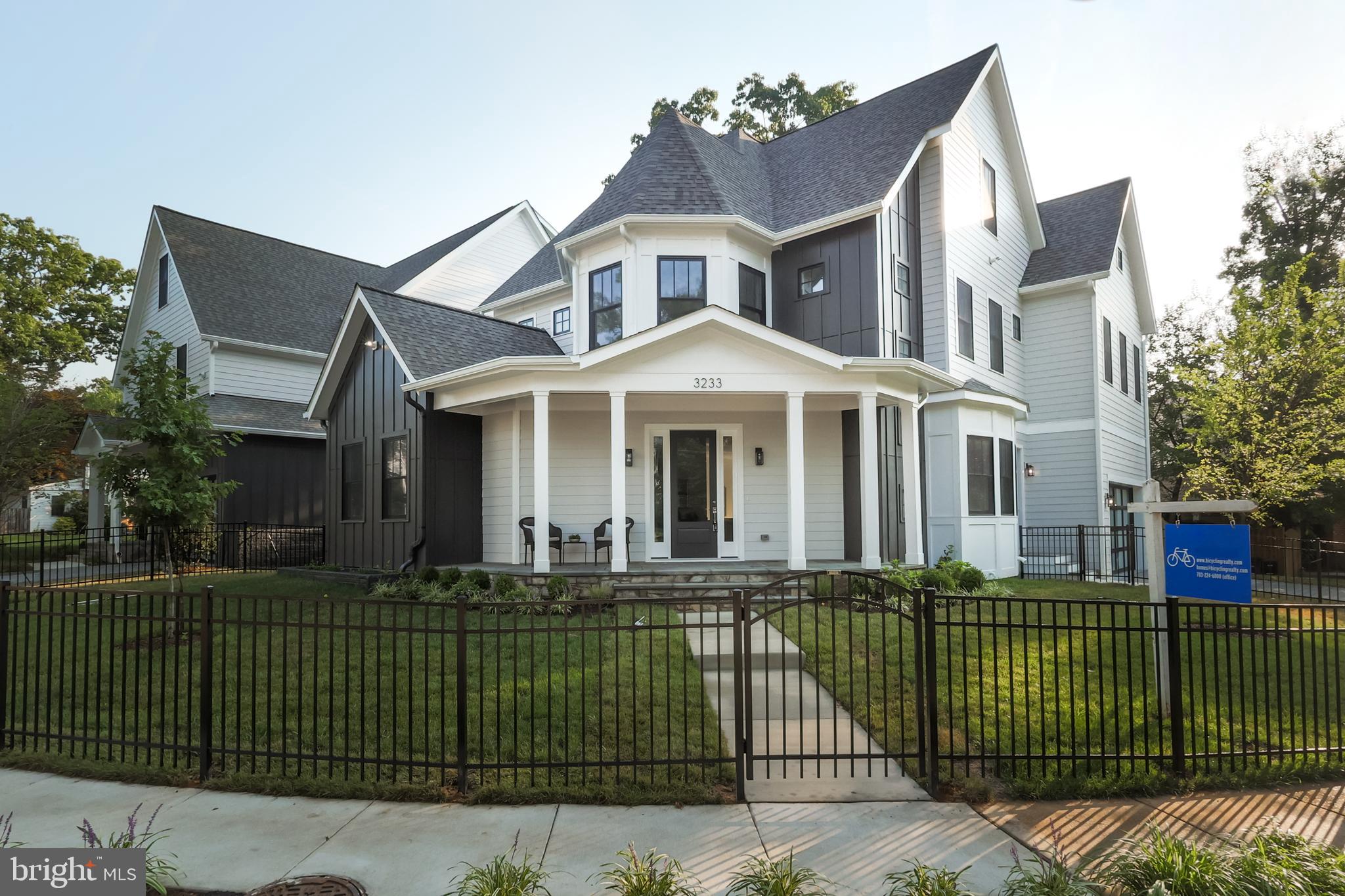 **Open Houses July 18th & 19th, 2 PM - 4 PM** Fresh to the market now: An exceptional luxury craftsman style home in the heart of sought after Ashton Heights. This brand new construction designed by Bukont Homes and built by Saffer Properties, is refined luxury in a premier location; walkable, bikeable or a short car ride to a host of urban amenities including the Clarendon and VA Square Metros and the bustling orange line corridor. At 5,528 SF (4254 finished SF, 1274 SF lower level) across four thoughtfully designed levels, this modern home features 6 bedrooms, 6 baths, blending timeless elegance with modern comfort.  The main level impresses with soaring 10-foot ceilings and exquisite wide-plank  European White Oak (Open Grain Brushed) hardwood flooring throughout. At the heart of the home, a stunning gourmet kitchen showcases sleek custom cabinetry, quartz countertops, a center island, Thermador appliances, and a seamless flow into the spacious family room, anchored by a floor to ceiling gas fireplace.  An elegant formal dining room is bathed in natural light, creating an ideal setting for gatherings both intimate and grand. The main level is further enhanced by a private guest suite or executive office, a custom mudroom with built-in cubbies, and a stylish powder room. Upstairs, the luxurious primary suite serves as a true retreat, complete with dual custom walk-in closets, and a spa-inspired bath featuring heated floors, dual vanities, a freestanding soaking tub, and an oversized glass-enclosed shower. The walk-out lower level is designed for both relaxation and recreation, offering a spacious entertainment room, a dedicated exercise room, and an additional bedroom with a full bath. The home also features PlyGem  windows,  a hot water recirculation line and pump to ensure fast hot water delivery to the top-floor bathrooms. gleaming hardwood floors, custom molding, extra wide wood staircases, numerous walk-in closets, maintenance free Trex decking, lush landscaping, ample storage, 3 heating and cooling zones, and an oversized 2-car garage and paver driveway. This new construction is priced at an amazingly reasonable $520 per SF.   What’s not to love? Zoned for Long Branch Elementary, Thomas Jefferson Middle School, Washington-Liberty High School.