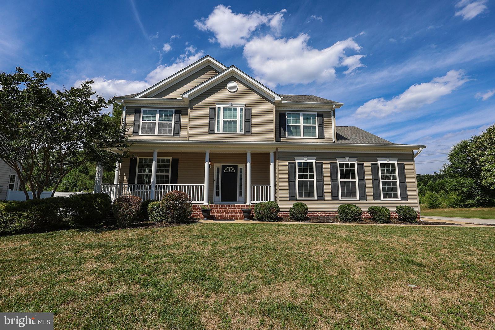 Two-story home with a fully finished basement offering over three finished levels of living space. The main level features an open kitchen, breakfast area, and family room, along with a separate dining room. Newly refinished hardwood floors, ceramic tile, and new carpet are found throughout the home. Additional features include 9-foot ceilings and crown molding.

The kitchen includes granite countertops, double wall ovens, a gas cooktop, soft-close cabinetry, and ample cabinet and counter space. The breakfast area opens to a maintenance-free deck overlooking the fully fenced backyard. The family room features a gas fireplace.

The upper level offers four bedrooms, including a primary suite with a walk-in closet and private bath featuring dual vanities, a soaking tub, and a large tiled shower.

The finished basement includes a fifth bedroom, full bath, recreation room, game area, and is pre-wired for a home theater surround sound system with ceiling projector connections.

Additional features include dual-zone HVAC, a tankless water heater, extended driveway, covered front porch, storage shed, and maintenance-free rear deck. Conveniently located near Pax River Naval Air Station, shopping, dining, schools, and other local amenities.