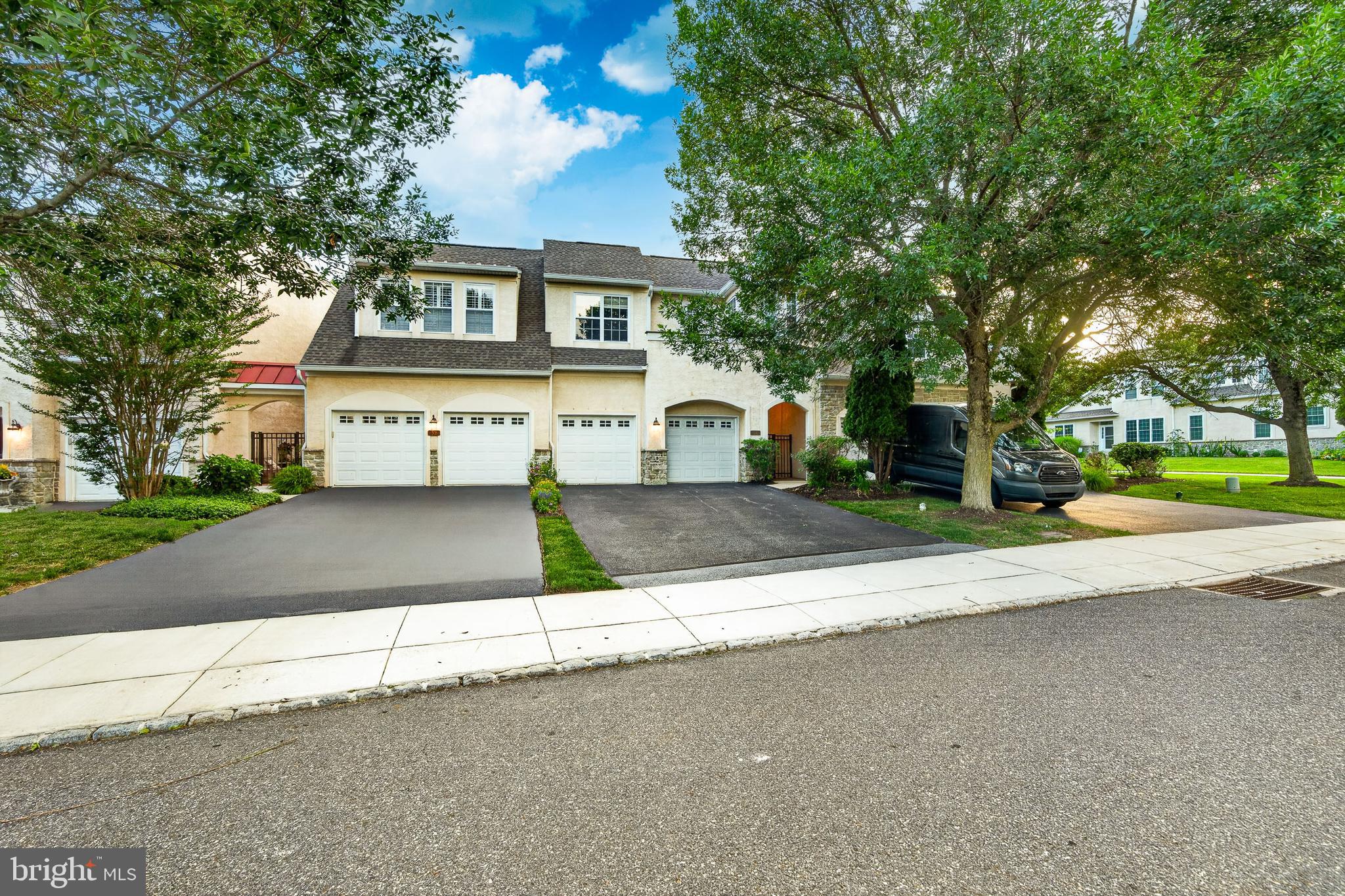 Inviting and luxurious, this McKee-built "Amherst" model carriage townhome is situated on a level lot in the sought-after Cherry Creek community. Located in Thornbury, Delaware County, and served by the award-winning West Chester Area School District, this elegant home features 3 bedrooms, 2 full baths, and 2 half-baths, offering a perfect blend of elegance, comfort, and convenience.

From the moment you enter the private paver courtyard, superior craftsmanship is evident throughout. The main level features beautiful, easy-to-maintain hardwood flooring, extensive custom trim, and wider moldings. A soaring two-story foyer leads to a formal dining room adorned with crown molding, chair-rail, and recessed lighting. The heart of the home is a double-sided gas fireplace connecting two spacious living areas bathed in natural sunlight, with sliders on the left leading to the rear deck—perfect for entertaining or enjoying secluded views.

The gourmet kitchen is absolutely wonderful for culinary enthusiasts, offering granite countertops, cherry cabinetry, a well-located pantry for easy storage, and updated stainless-steel appliances (including a 2025 dishwasher and microwave). The space provides both a breakfast bar and room options, with sliders offering a cross-breeze and secluded views of the courtyard. This level also provides inside access to the attached 2-car garage and a 2-vehicle driveway, with overflow parking within walking distance.

On the second floor, a large landing leads to a huge primary suite featuring a tray ceiling, ceiling fan, and an adjoining room that can serve as an office, den, study, or workout room. The suite includes double large walk-in closets with organizers and a spa-like en-suite bath with a soaking tub, walk-in tiled corner shower, and double vanity. A sun-drenched hallway leads to two additional bedrooms, a full hall tub bathroom, and a second-floor laundry room with a utility sink.

The finished basement offers a large separate living space with an expanded powder room, perfect for use as a media room, rec room, or workout playroom, plus an unfinished area for extra storage. Enjoy a low-maintenance lifestyle with an HOA that covers lawn care, snow removal, and trash. The Cherry Creek community also offers preserved open space, natural wetlands, walking trails, and sidewalks.

Major Recent Upgrades: Roof (10/2021), HVAC (6/2020), Hot Water Heater (2019), Primary Bedroom Carpet (11/2023), Refrigerator (11/2020), Gas Range (7/2023), and 2025 Dishwasher/Microwave.

The home's 1st floor just completed painting June 20th, 2026. The location is convenient to all shopping, schools and transportation. Wegmans, Cosco, Giant, and Wawa all nearby, with easy access to Rt 202, Rt 1, and tax-free Delaware shopping. It is a short drive to the Borough of West Chester, parks, and historic sites, and approximately 45 minutes to Philadelphia and 25 minutes to the airport and NJ bridges. Possible seller concessions for a strong offer. Furnished photos are of a previous resident and used to give the buyers an idea on who to use the incredible space of this home.