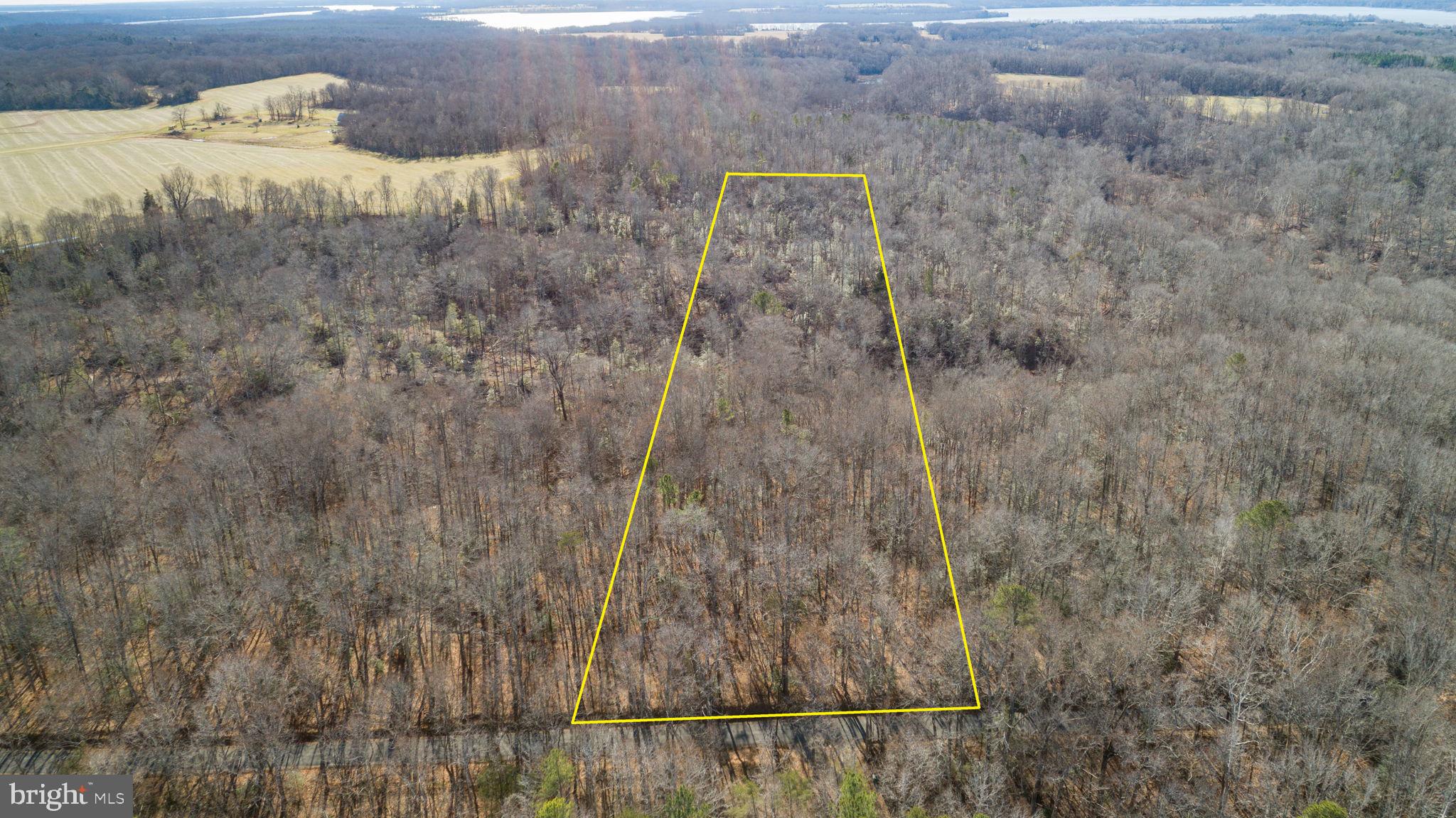 10 acre wooded lot in desirable King George County--approved for 4 bedroom conventional septic. Private setting with proposed homesite identified, offering a head start on building your dream home. Ideal for those seeking space, privacy, and natural surroundings. No HOA. Soil work and site plans available in documents section.