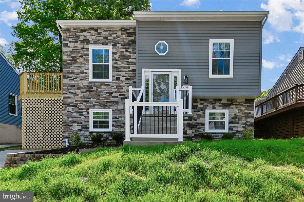 This stunning new construction, completed in 2026, boasts a modern split foyer design that perfectly balances style and functionality. With 4 spacious bedrooms and 2 full bathrooms, this home is designed for comfort and convenience. Step inside to find a modern interior, complemented by a fully finished basement that offers endless possibilities for entertainment or relaxation. The exterior features a charming blend of stone and vinyl siding, ensuring durability and curb appeal. Enjoy sunny days by your personal in-ground pool, perfect for gatherings or quiet afternoons. With a generous driveway accommodating two vehicles, parking is a breeze. This home is not just a place to live; it's a lifestyle. Embrace the tranquility of Green Haven while being just moments away from local amenities.