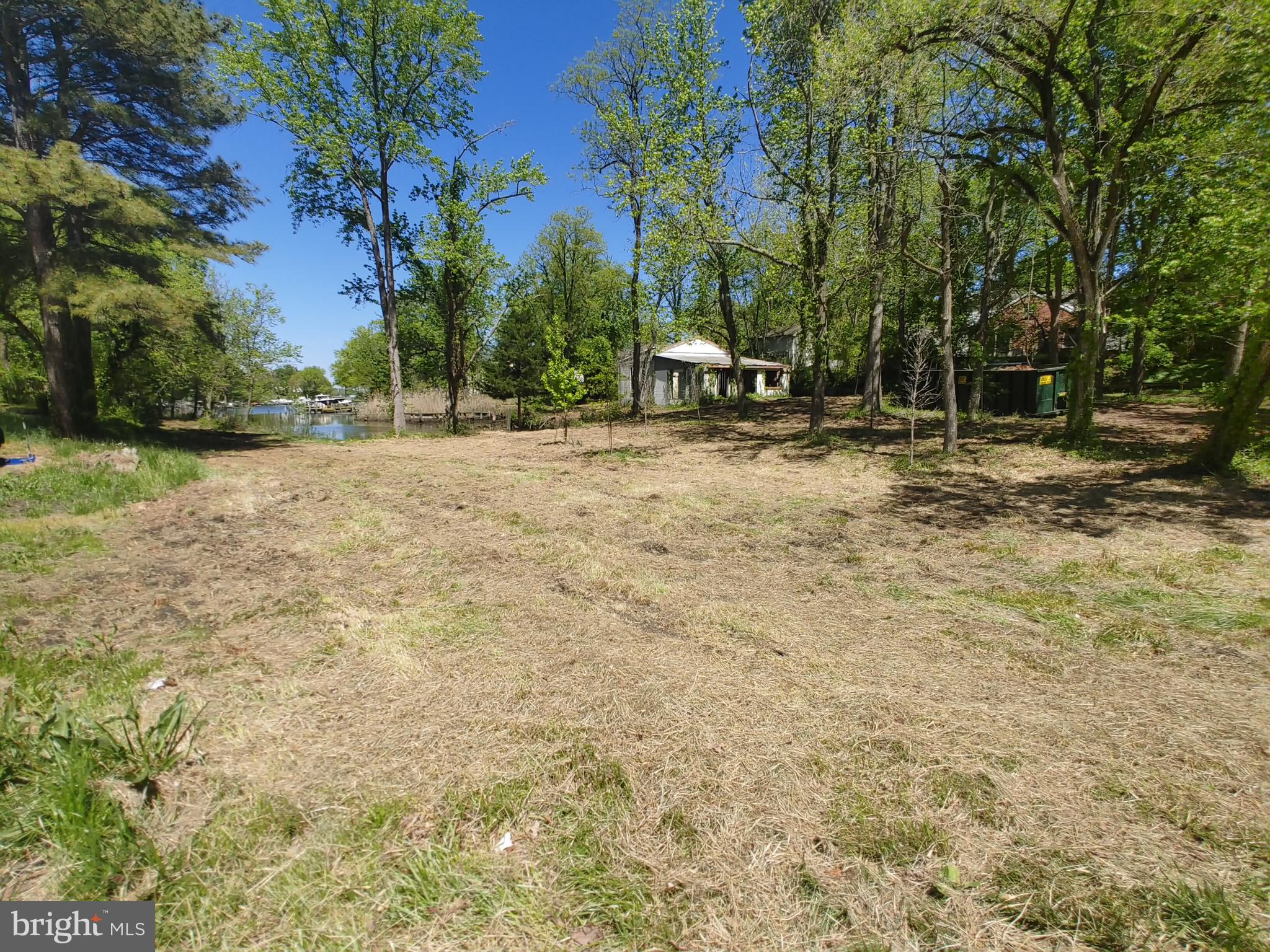 Discover an exceptional investment opportunity with this stunning 1.17-acre waterfront lot in the coveted Shoreham Beach subdivision. Nestled along a serene creek, this property boasts an impressive 500+ feet of water frontage, offering unparalleled access to a variety of water activities, including canoeing, kayaking, and fishing. Imagine the potential for a private dock site, perfect for boating enthusiasts and those seeking a tranquil retreat. The breathtaking water views create an idyllic backdrop for your future development, whether it be a vacation rental or a luxurious private residence. The location's natural beauty and recreational opportunities make it a prime candidate with high demand, ensuring strong returns on investment. With navigable waters and riparian rights, this lot is not just a piece of land; it's a gateway to a lifestyle that attracts outdoor lovers and investors alike. Seize this chance to secure a slice of paradise that promises both enjoyment and financial growth. Don't miss out on this rare gem!