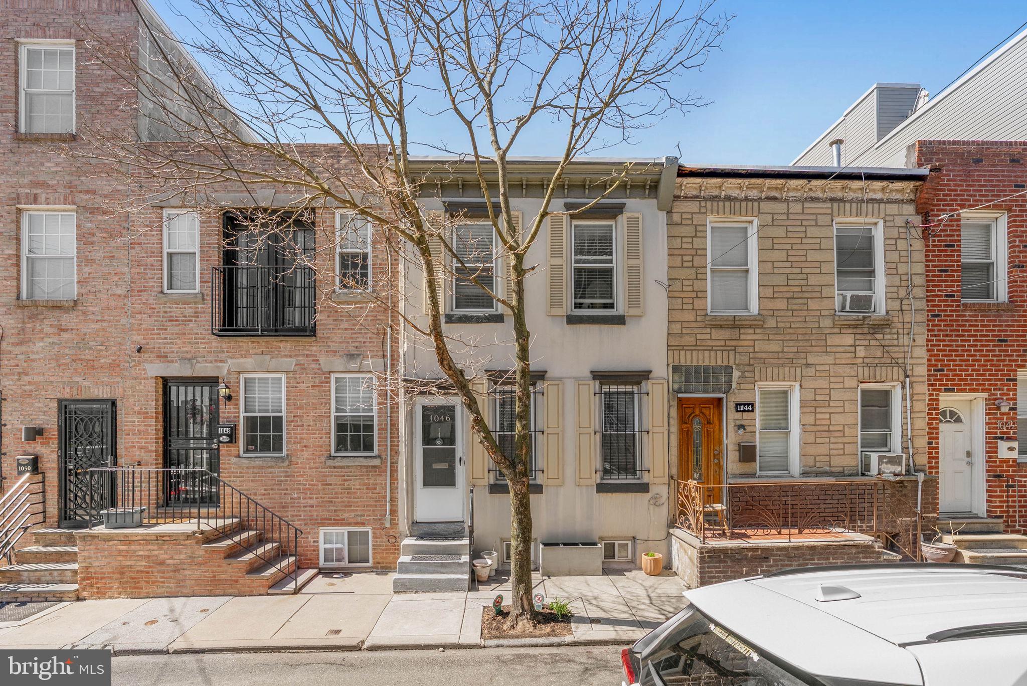 Welcome to 1046 S Dorrance Street — a charming, light-filled 2-bedroom, 1-bath home ideally situated in the heart of Graduate Hospital. This turn-key residence features a fully renovated kitchen complete with sleek white cabinetry, black subway tile backsplash, granite countertops and updated appliances. Enjoy seamless indoor-outdoor living with a spacious rear yard, ideal for entertaining, relaxing, or gardening. Inside, the home is filled with natural light, creating a warm and inviting atmosphere throughout. Additional highlights include an unfinished basement with washer and dryer, offering excellent storage potential, and a sizable walk in closet on the second floor. Located just a 7-minute walk to Rittenhouse Square and within close proximity to Broad Street, UPenn, the South Street Bridge, and some of the city’s best bars and restaurants. Transferable roof warranty! Schedule your tour now!