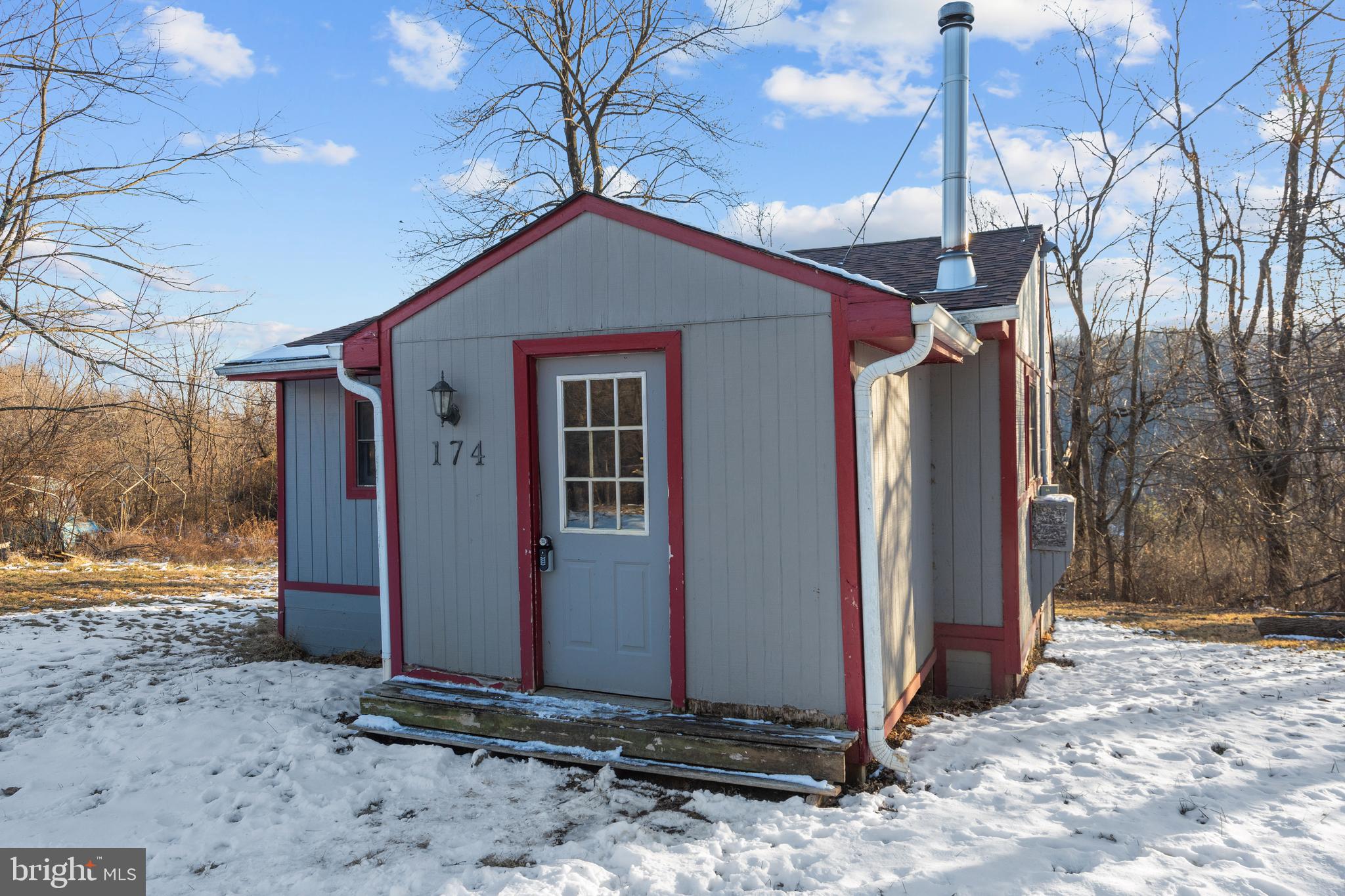 Pending Release.  Charming 2-bedroom, 1-bath bungalow in Front Royal situated on a spacious lot. This property offers great potential and is ready for your personal touch. Features include a cozy wood-burning stove in the living room and a washer and dryer already on site. Newer roof and hot water heater.  Please note, there is no air conditioning. Ideal as a weekend getaway—peaceful and removed from city life, yet conveniently close to local shops and restaurants.   The septic tank was pumped and is in very good condition according to the septic company. This property is being SOLD AS IS!