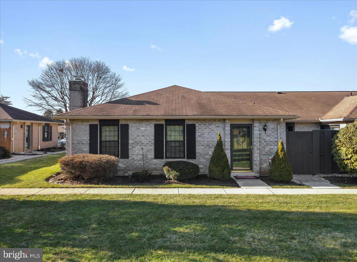 Well maintained 2 BR/2BA first floor condo in desirable Fairways at Brookside.   Open concept dining room and living room with cathedral ceilings & beam accents that leads to a private newer paver patio.  Sunlit eat-in kitchen with pantry, lots of cabinets, and built-in hutch.  Relax in family room with fireplace and built-in book shelve.  Master suite has walk-in closet and stall shower and access to the private fenced in patio.  All appliances stay for your convenience.  First floor laundry.   Other amenities that include; updated windows, new water heater, closets galore (4 walk-in), newer heat pump, central air, and plenty of storage space.   Condo fee includes lawn care, snow & trash removal, community pool, tennis court, and clubhouse facility.  Close to everything.