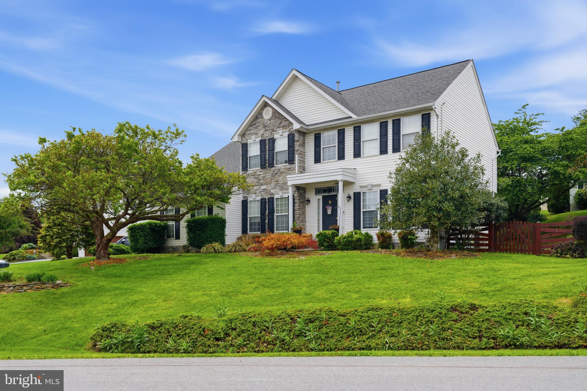 Welcome to Foxleigh Meadows! This stunning home is in a fantastic location! Imagine hosting friends in the beautifully remodeled gourmet kitchen with granite countertops and a wine fridge, or unwinding on the cozy enclosed sunroom while enjoying views of the lush, professionally landscaped lawn and charming terraced flower beds. Inside this home, you'll find open spaces, designer paint colors, and gorgeous finishes.  Built-in bookcases in the office/den and the family room. The gas-burning fireplace is framed with bookshelves.  Formal Living Room, Dining Room, and 2-story foyer. The upper level offers 4 spacious bedrooms, including an oversized Master suite with a sitting area, a luxury master bathroom, and his-and-hers walk-in closets.  The lower level is fully unfinished and has a bathroom rough-in. No HOA and no city taxes.